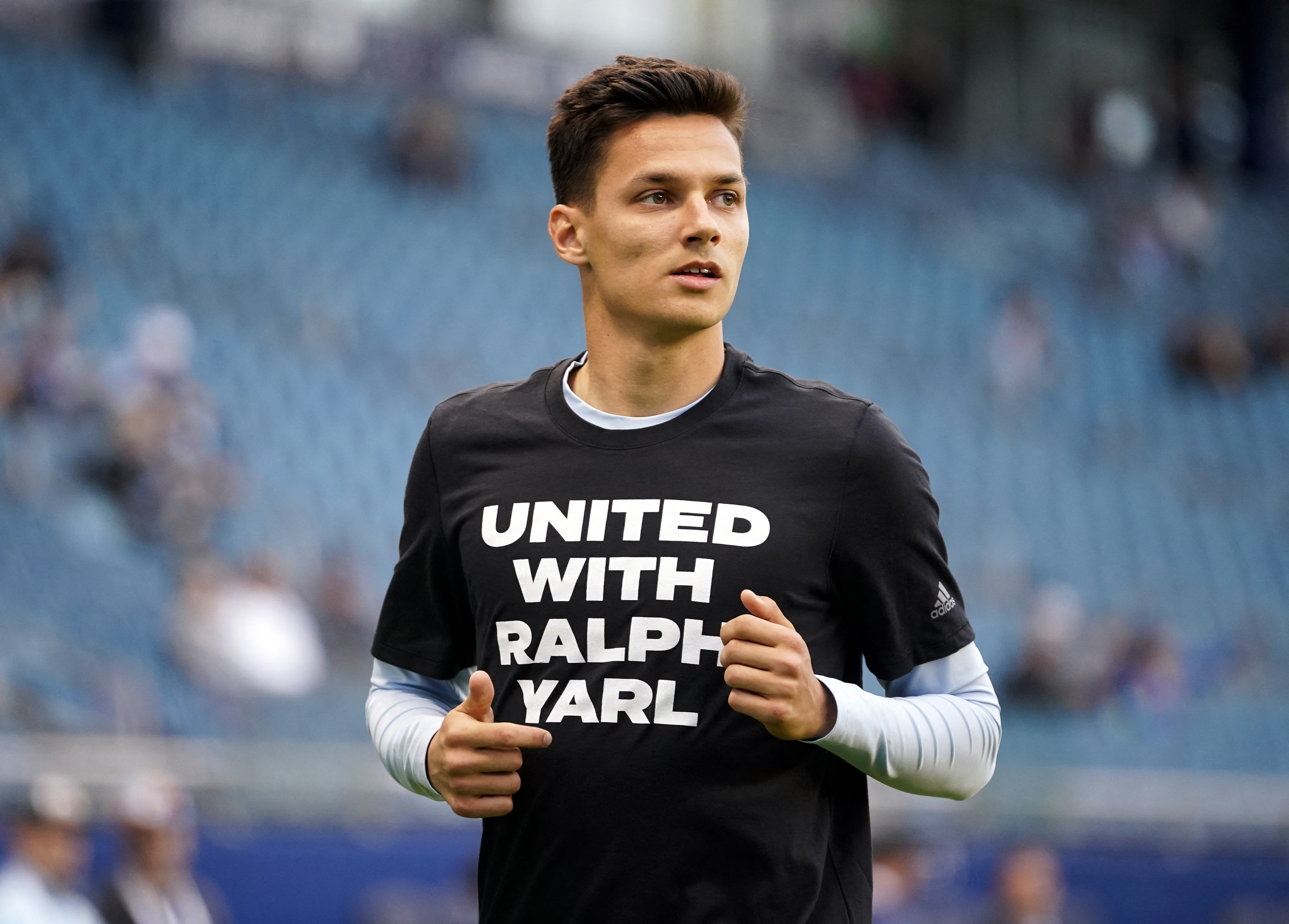 Apr 25, 2023; Kansas City, KS, USA; Sporting Kansas City forward Daniel Salloi (20) warms up while wearing a shirt supporting Ralph Yarl prior to a match against Tulsa Athletic at Children's Mercy Park. Mandatory Credit: Jay Biggerstaff-USA TODAY Sports