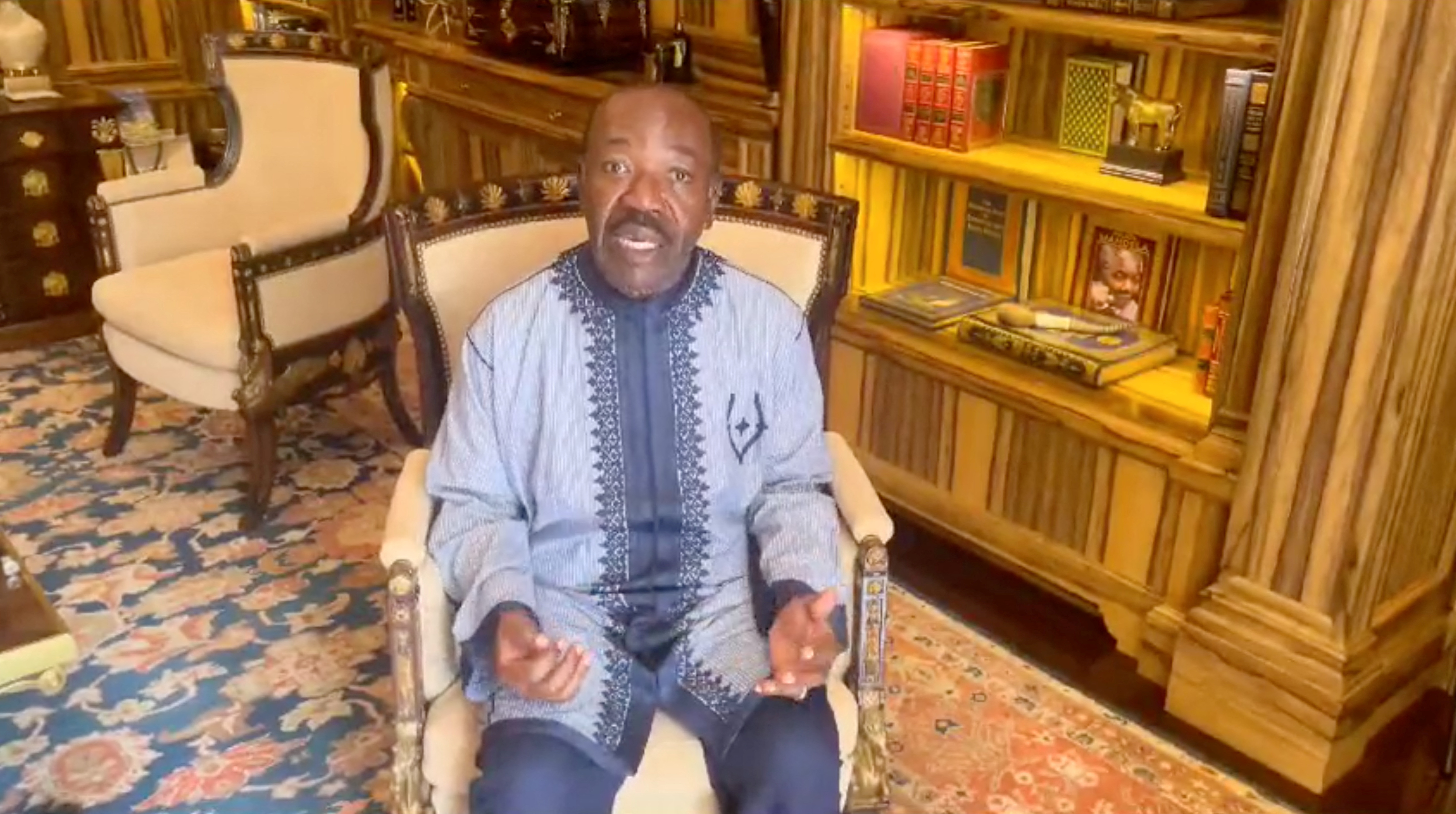 Gabon President Ali Bongo makes a statement through a video message, after the Gabon military had seized power, at an unknown location, in this screen grab taken from a social media video released on August 30, 2023. Video Obtained by REUTERS/via REUTERS THIS IMAGE HAS BEEN SUPPLIED BY A THIRD PARTY. NO RESALES. NO ARCHIVES.