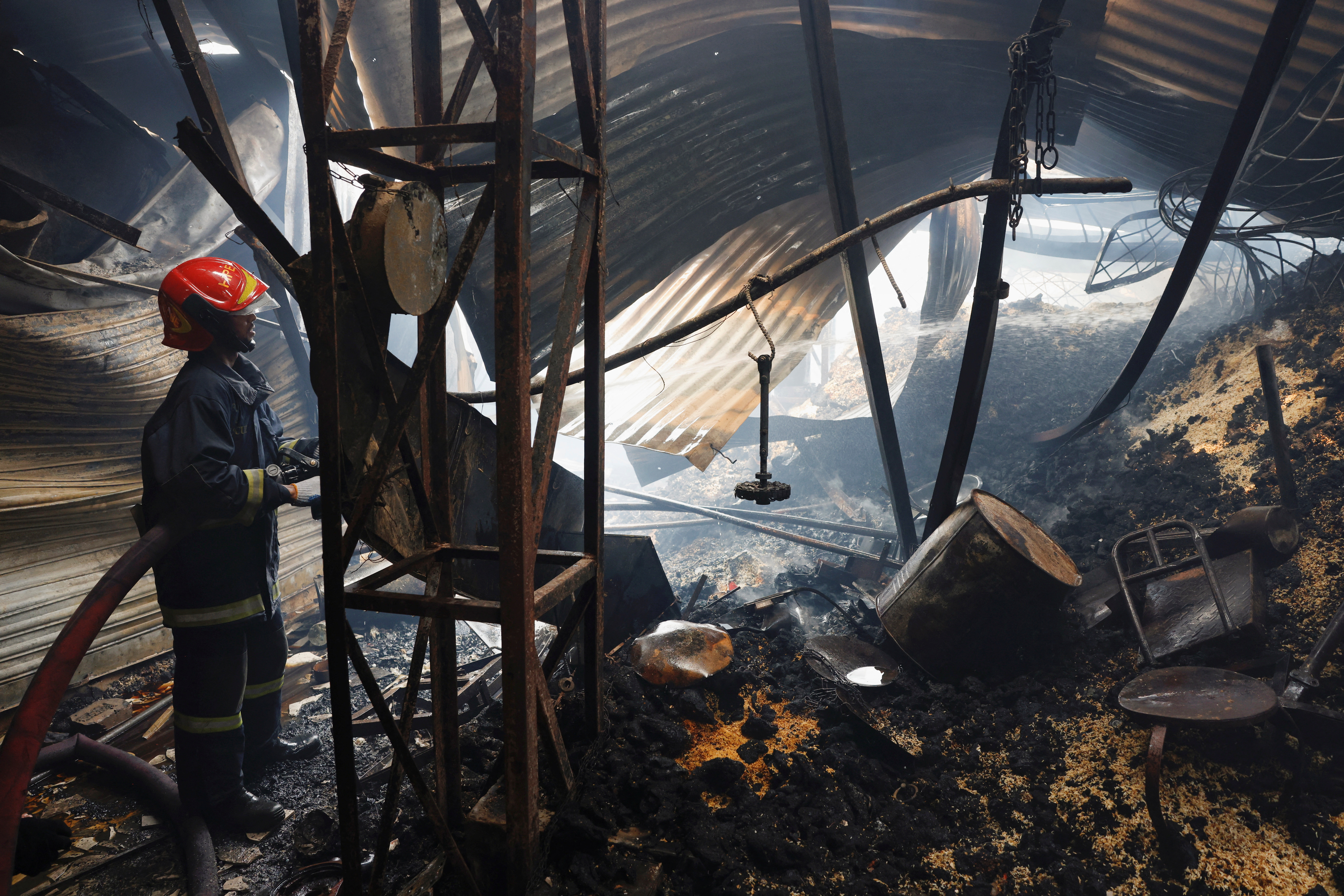 Hundreds of shops gutted in market fire in Bangladesh
