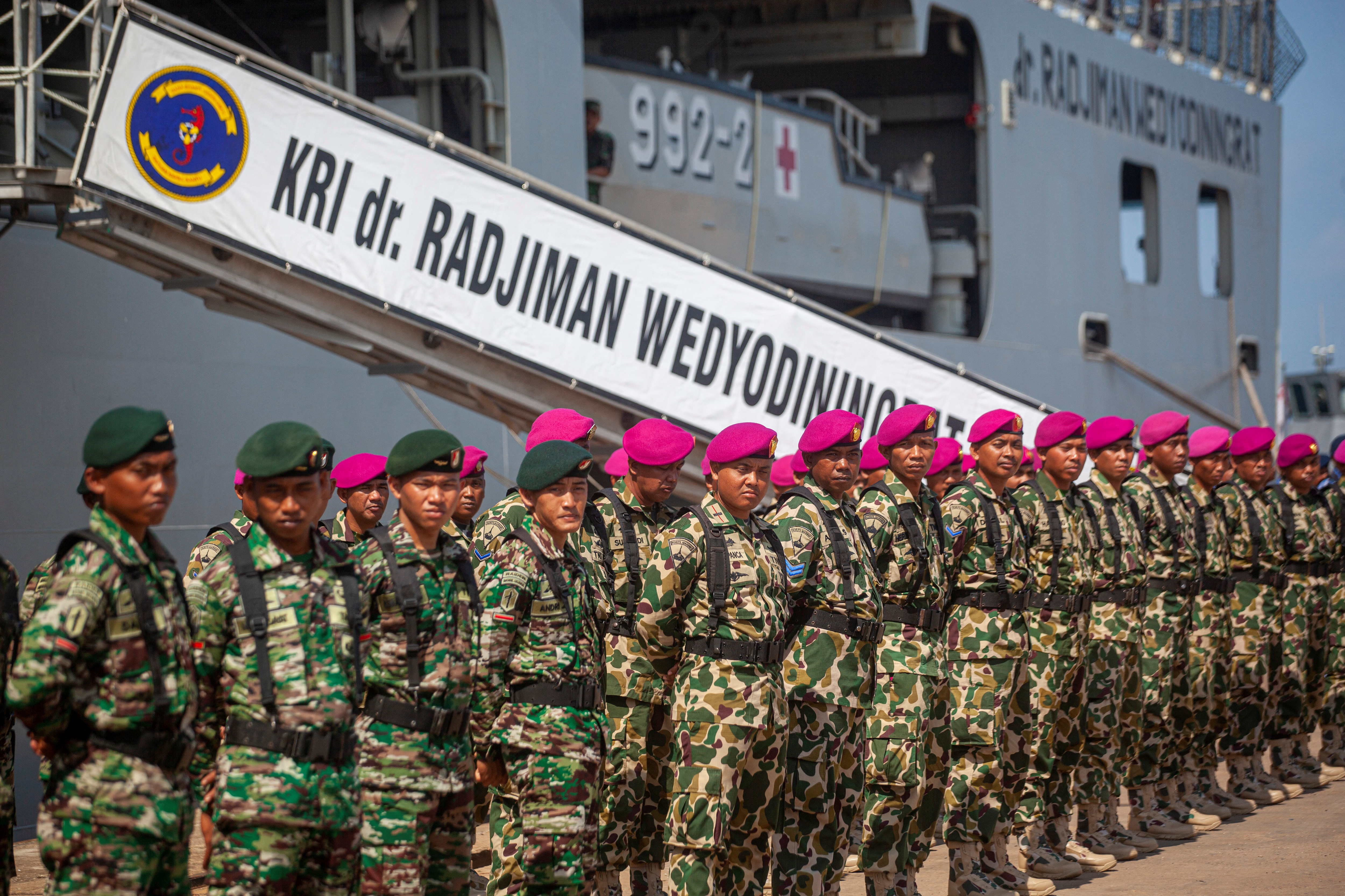 Indonesian military personnel lined up on the quay at the start of the ASEAN Solidarity Exercise