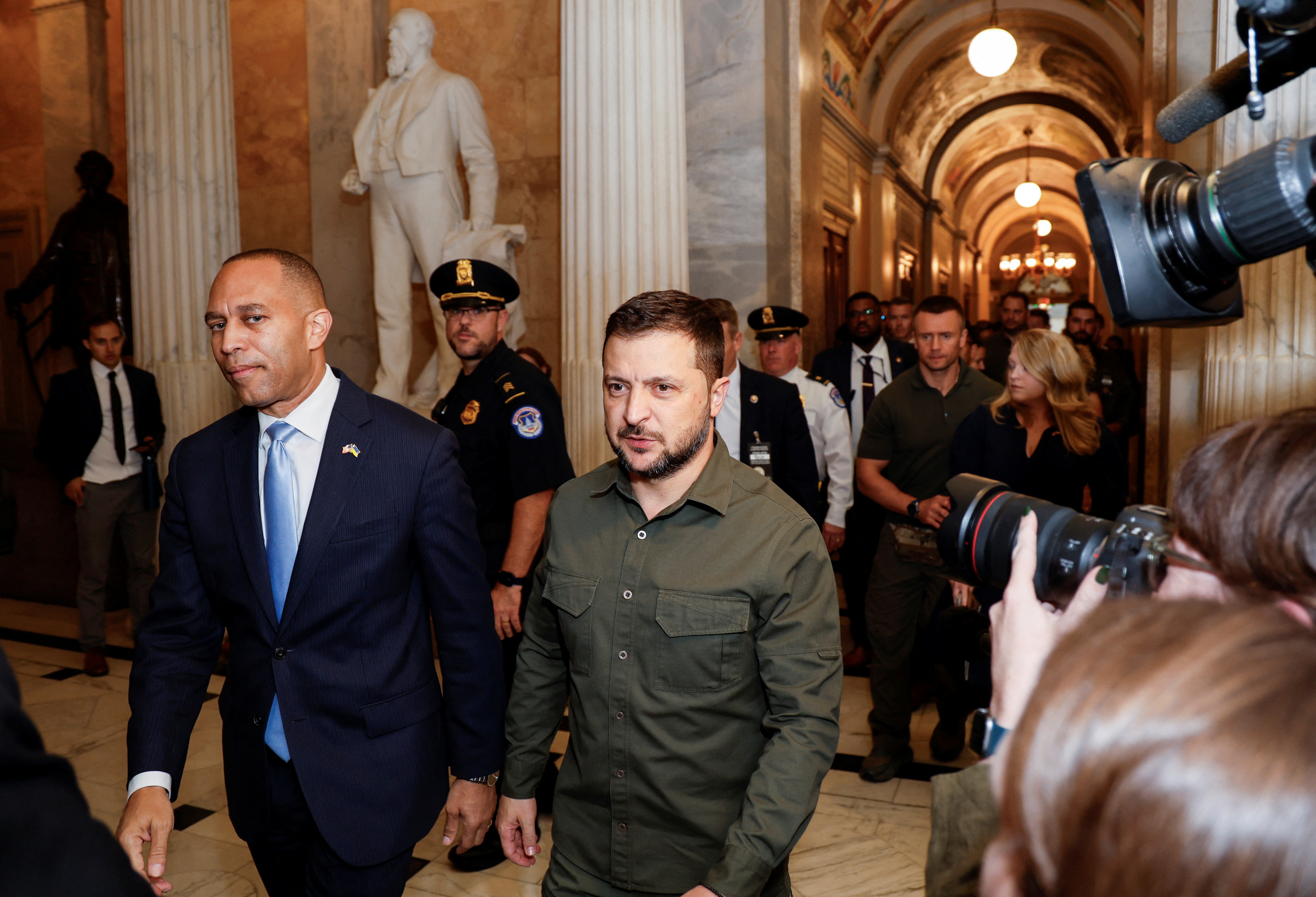 Ukrainian President Volodymyr Zelenskiy is escorted by Minority Leader of the U.S. House of Representatives Hakeem Jeffries as he arrives to meet privately with House Speaker Kevin McCarthy (R-CA) and other congressional leaders on a visit to the U.S. Capitol in Washington, September 21, 2023. REUTERS/Jonathan Ernst
