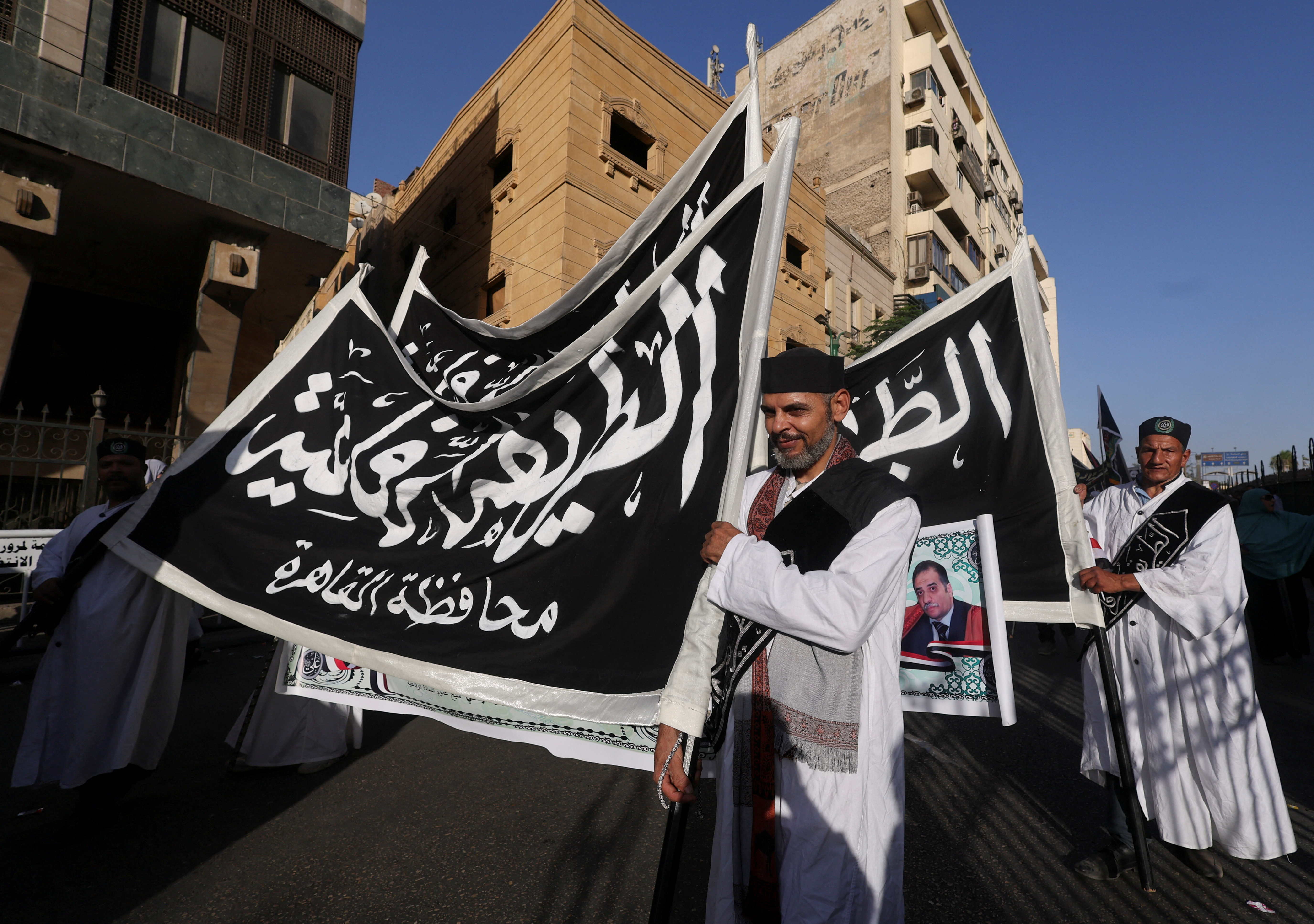 Sufi Muslims chant and march to celebrate "Mawlid al-Nabawi", or the birth of Prophet Mohammad, in Al Azhar district, Old Cairo, Egypt, September 27, 2023. REUTERS/Amr Abdallah Dalsh