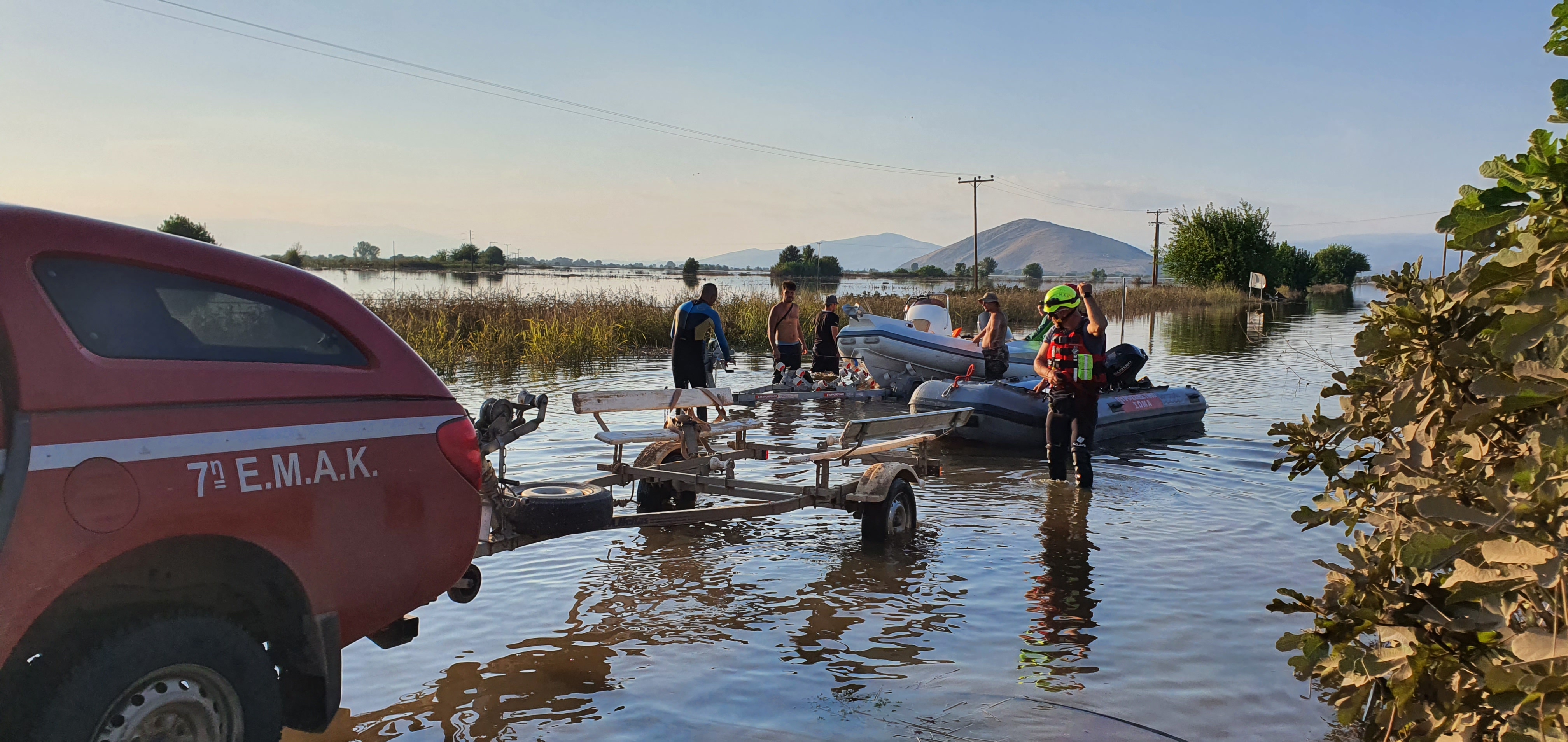 Fire fighters helping people during severe flooding
