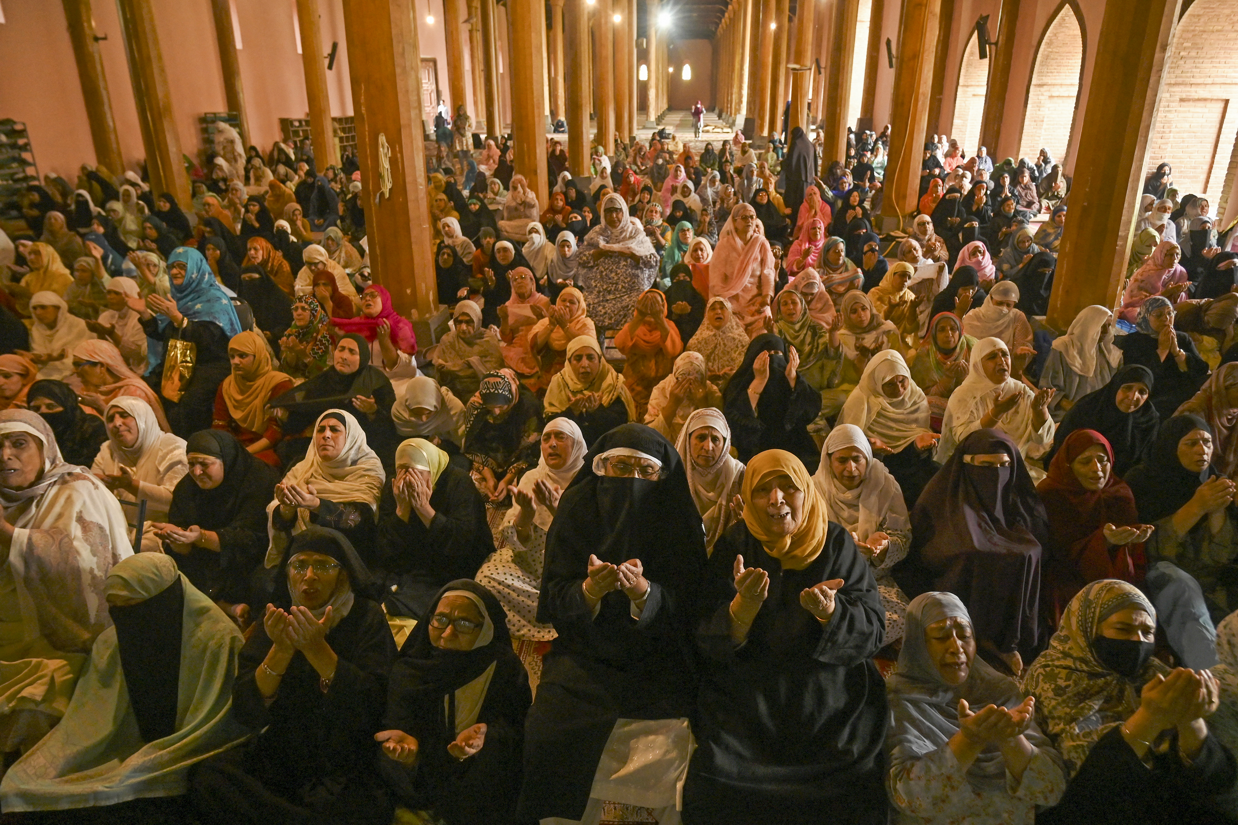 Kashmiri Muslim devotees pray at Jamia Masjid in downtown Srinagar