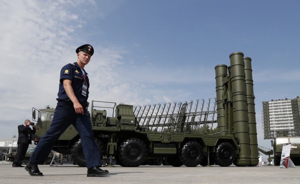 epa07194791 (FILE) - A Russian military official walks in front of The S-400 'Triumph' anti-aircraft missile system during the Army 2017 International Military Technical Forum in Patriot Park outside Moscow, Russia, 22 August 2017 (reissued 28 November 2018). According to reports, Russia is planning to deploy S-400 missile systems on the Crimean Peninsula in the wake of the latest crisis with Ukraine. Three Ukrainian war ships were seized and their crew arrested by Russian navy for an alleged violation of the Russian sea border in the Kerch Strait connection the Balck Sea and the Sea of Azov. EPA-EFE/YURI KOCHETKOV