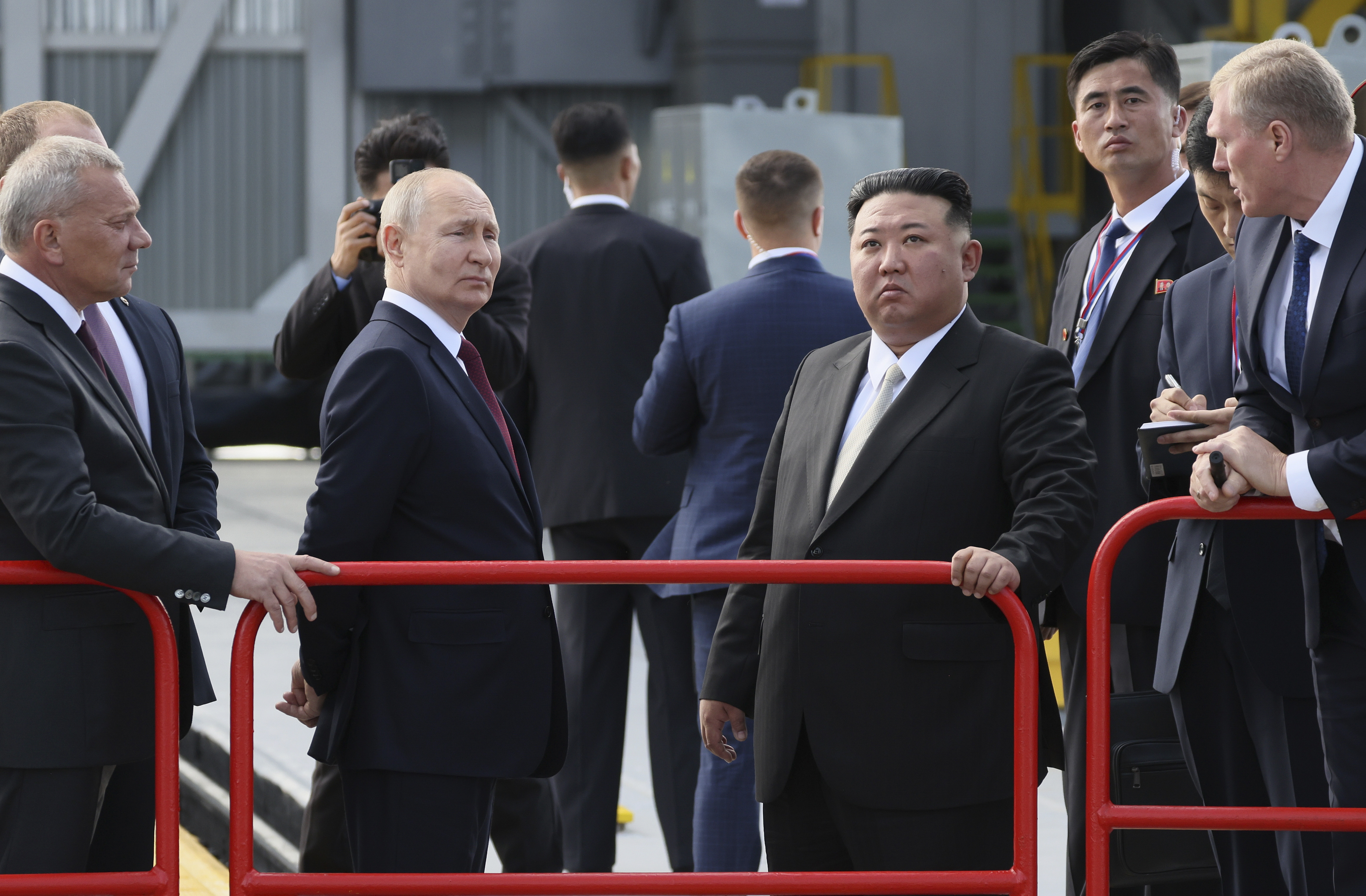 Russian President Vladimir Putin and North Korea's leader Kim Jong Un examine a launch pad during their meeting at the Vostochny cosmodrome outside the city of Tsiolkovsky