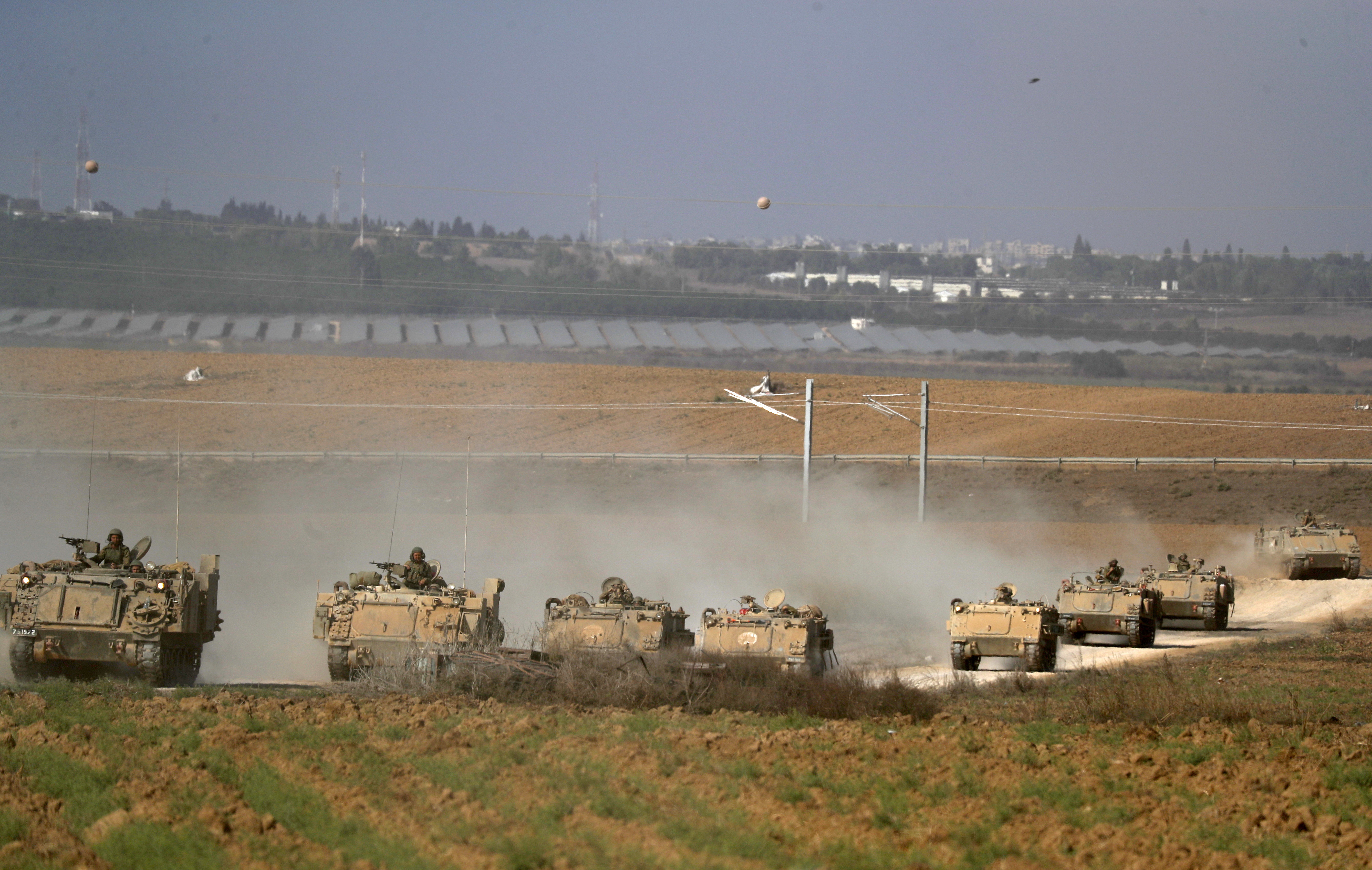 Israeli tanks take up position near Israel's border with the Gaza