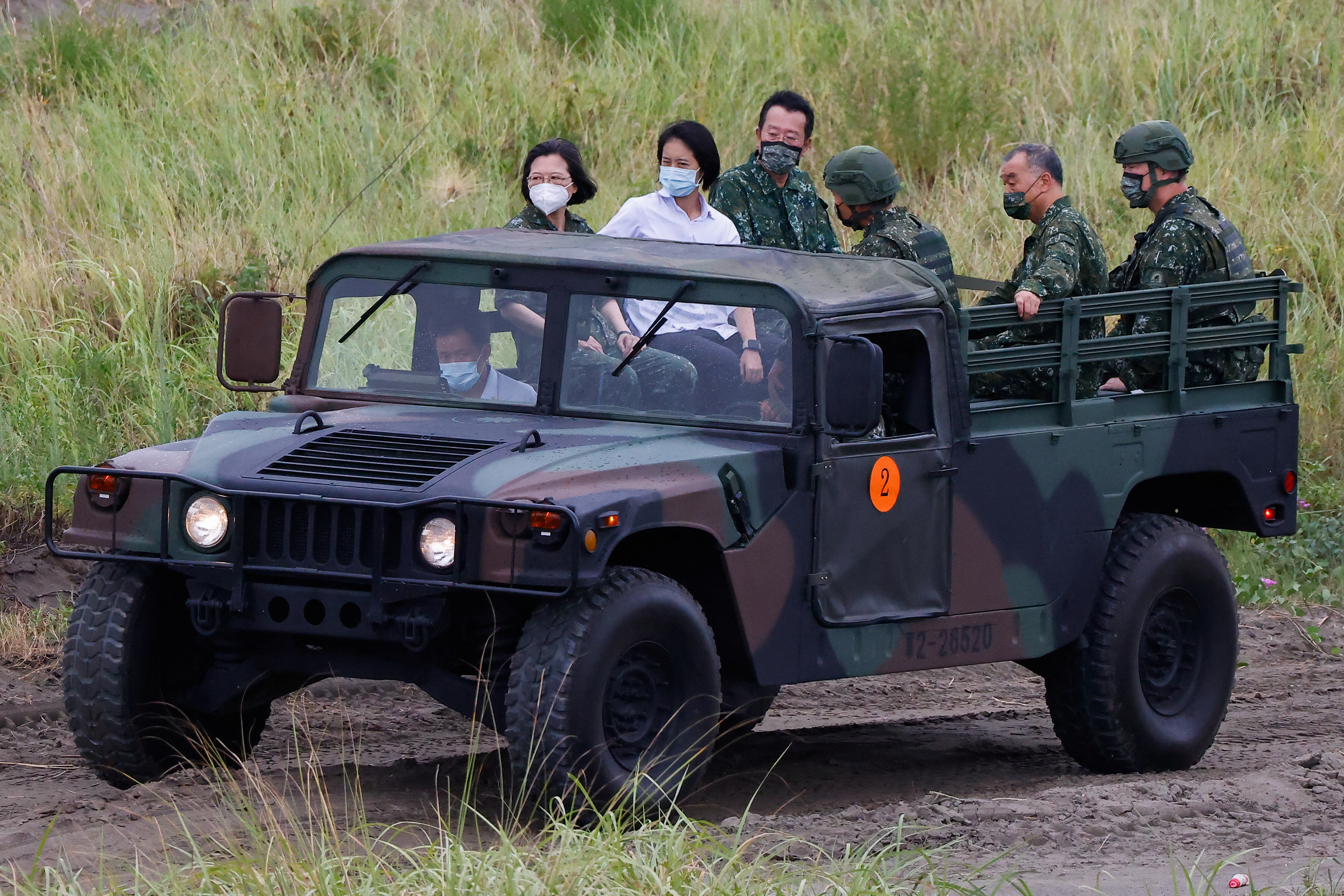 Tsai Ing-wen inspecting a drill at the Han Kuang exercises. She is standing in an open top jeep