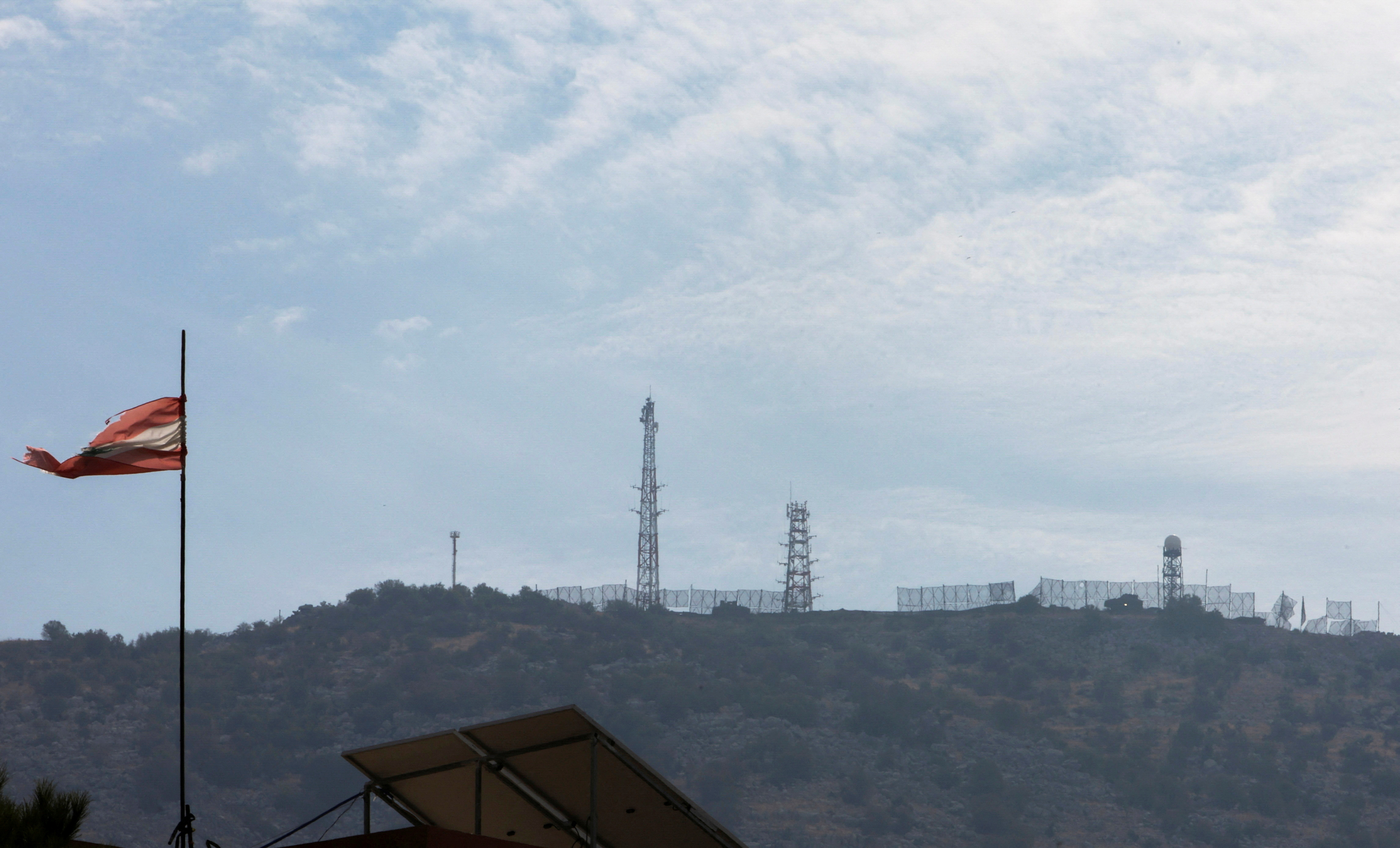 A view shows Israeli positions in the Israeli-occupied Shebaa farms as pictured from Kfarchouba, near the border with Israel, southern Lebanon, October 8, 2023. REUTERS/Aziz Taher REFILE - QUALITY REPEAT 