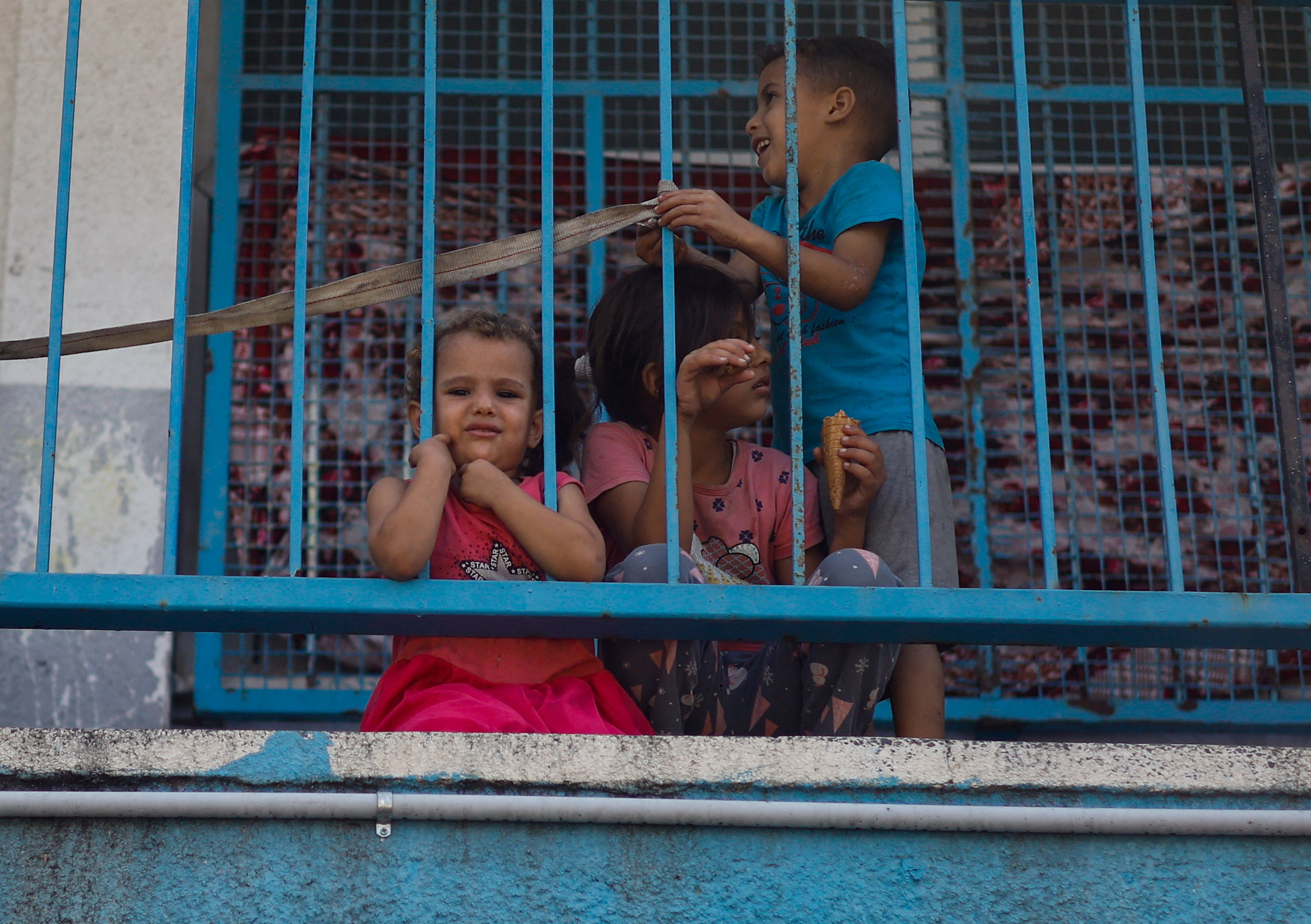 Palestinian children shelter in UN schools.
