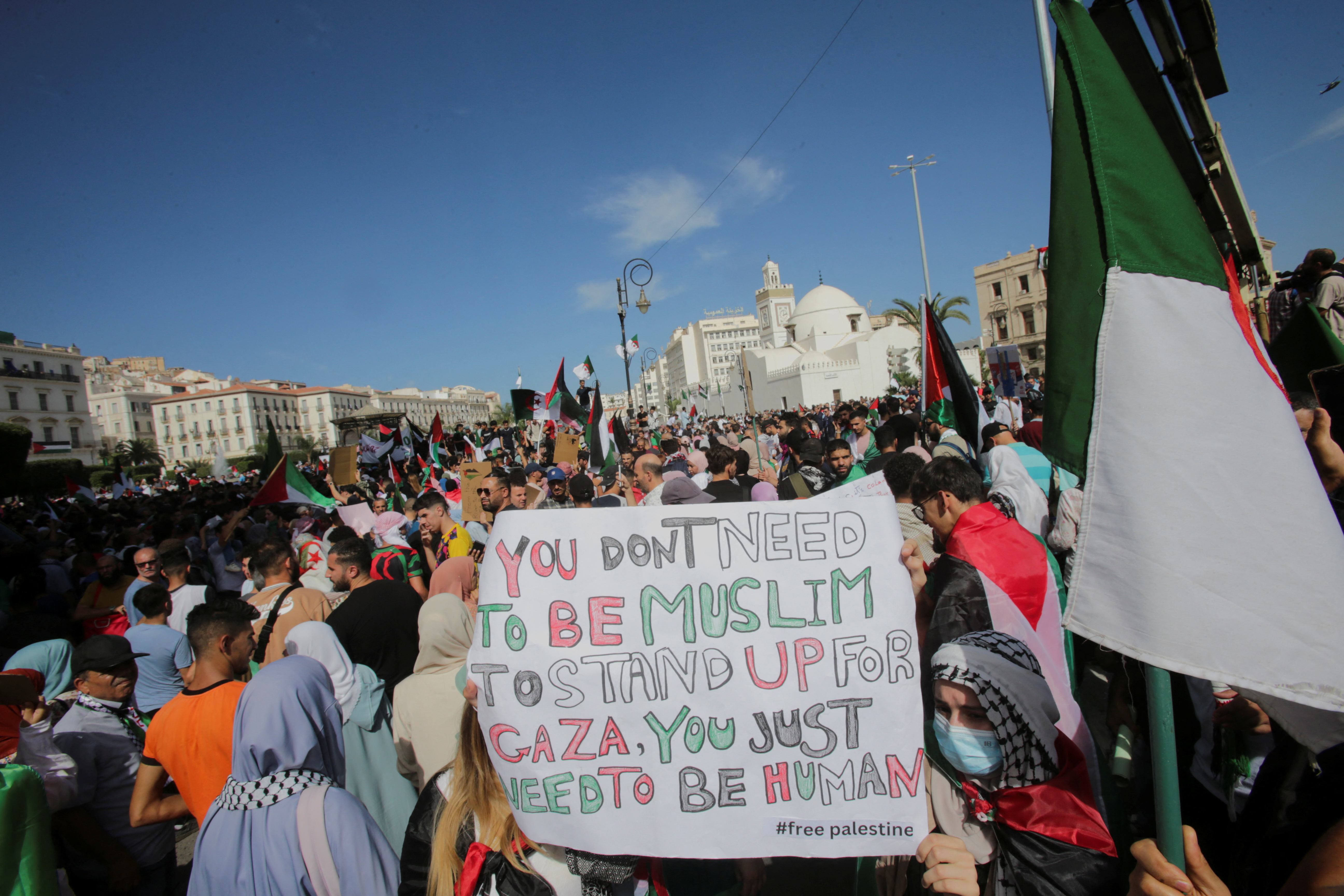People protest in support of Palestinians in Gaza, as the conflict between Israel and Hamas continues, in Algiers, Algeria October 19, 2023. REUTERS/Ramzi Boudina