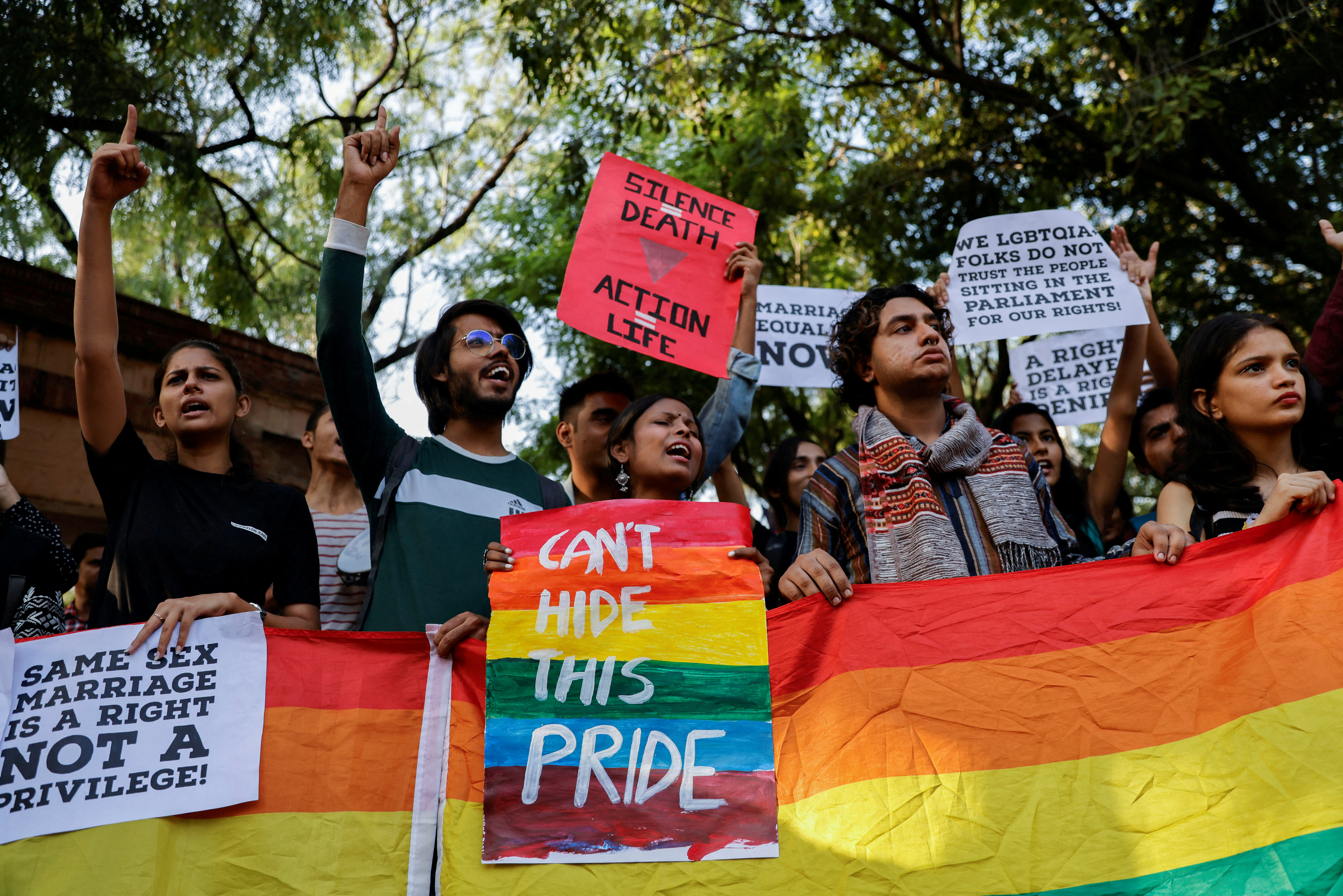LGBTQ students and activists take out a march in New Delhi after the top court declined to legalise same-sex marriage and left it to parliament to decide [Anushree Fadnavis/Reuters]