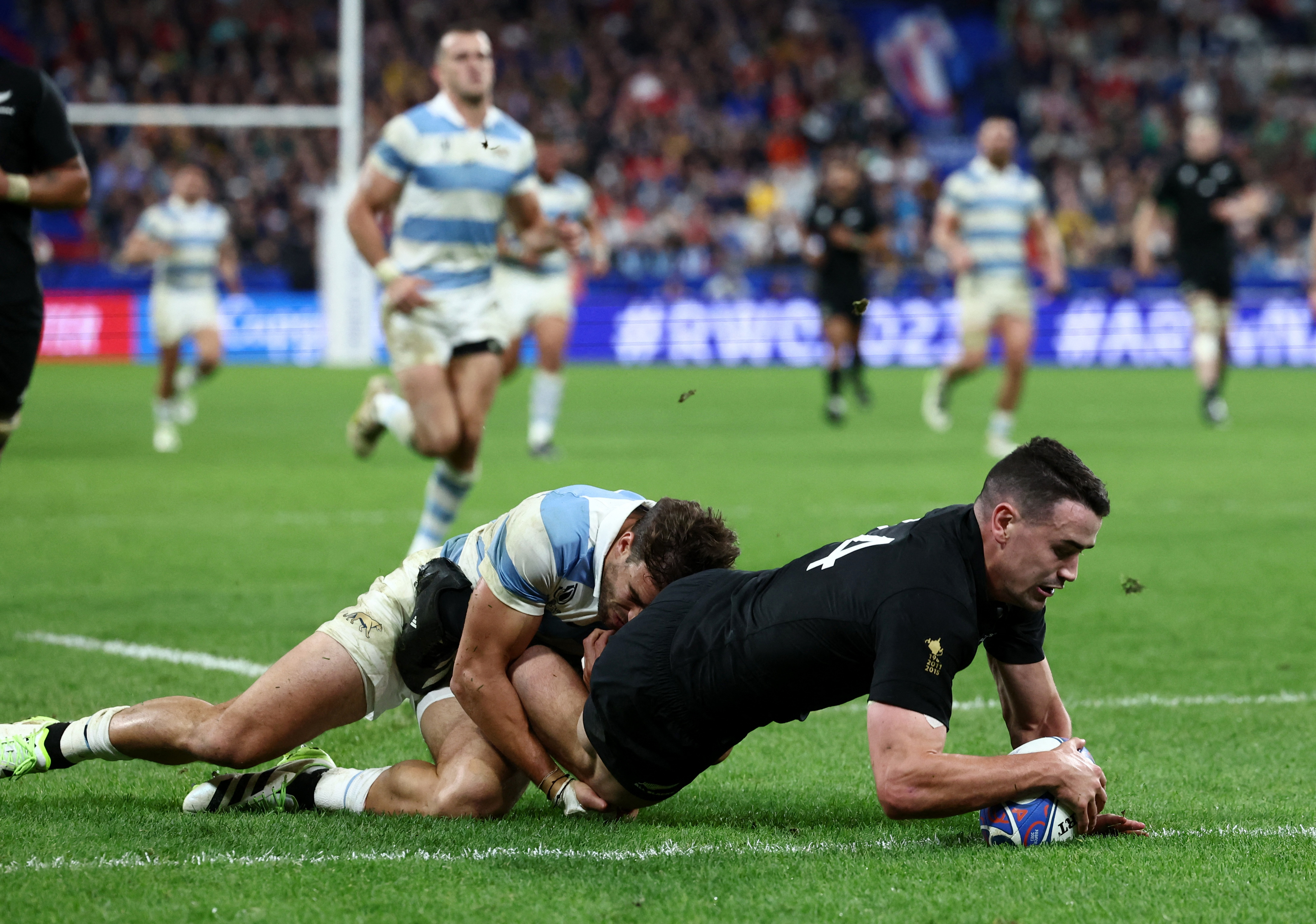New Zealand's Will Jordan scores their seventh try and completes his hat-trick