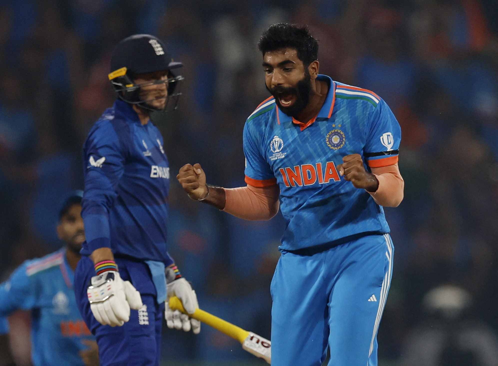 India's Jasprit Bumrah celebrates after taking the lbw wicket of England's Joe Root