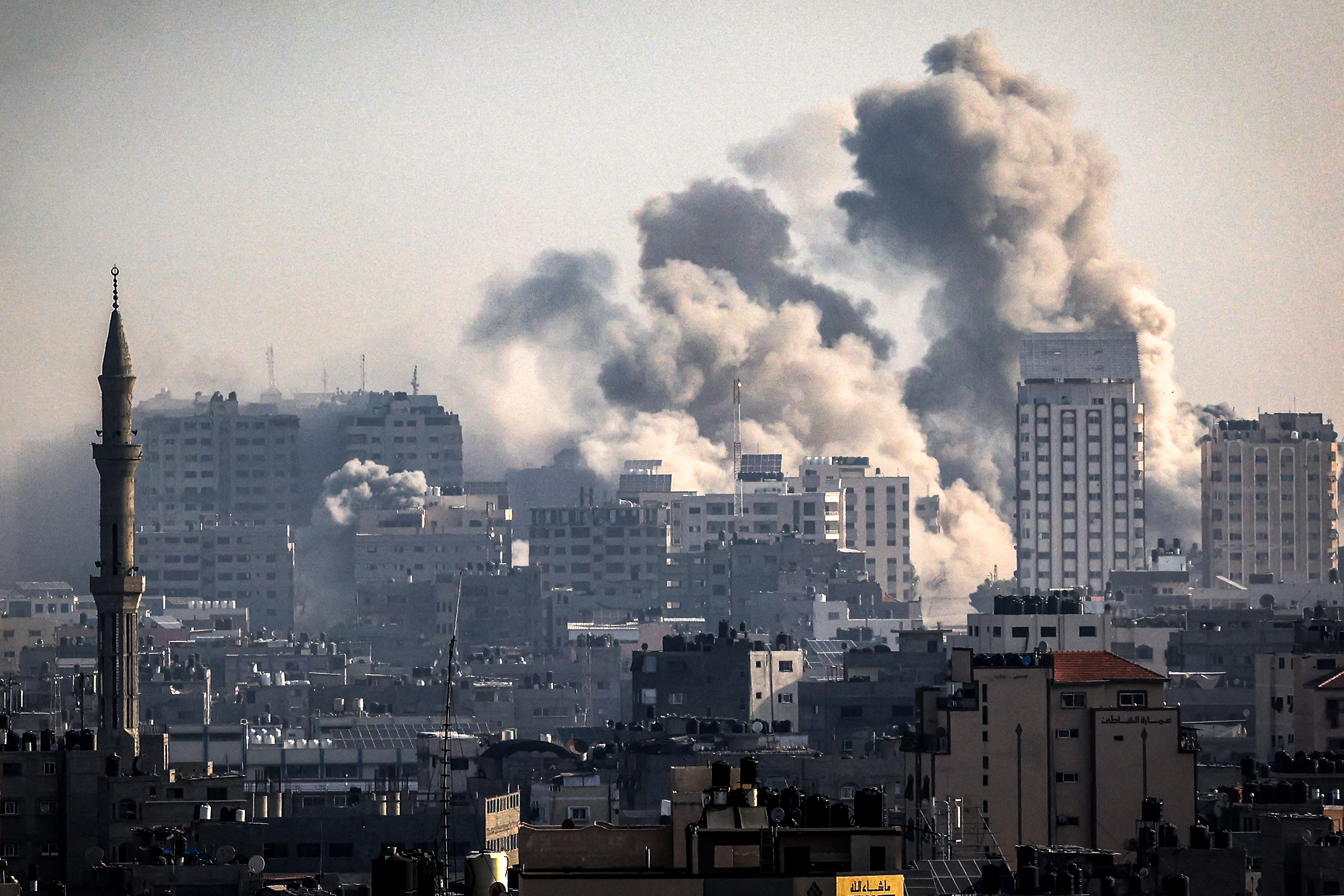 Smoke plumes billow during Israeli air strikes in Gaza City