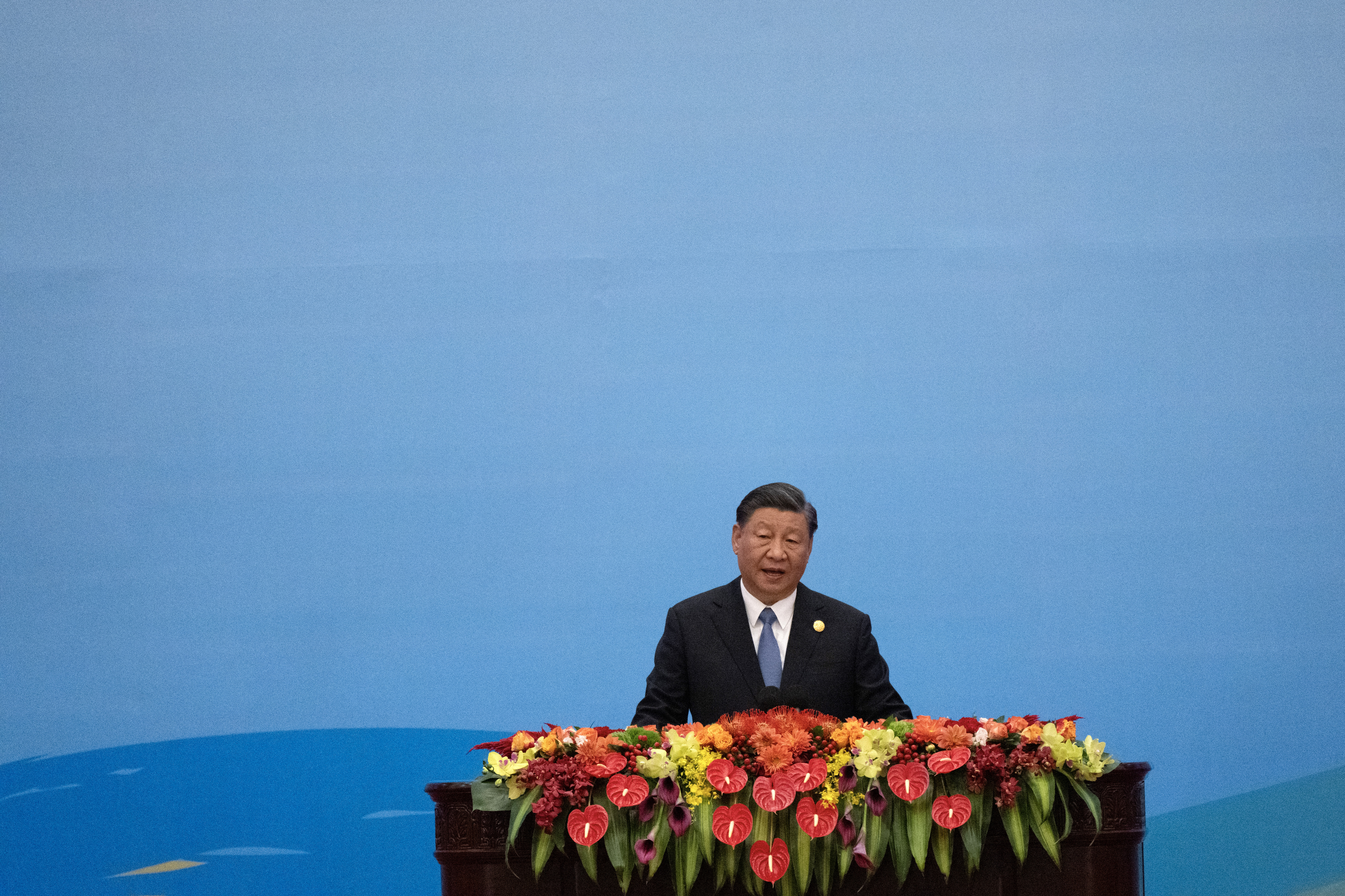 China's President Xi Jinping speaks during the opening ceremony of the third Belt and Road Forum for International Cooperation at the Great Hall of the People in Beijing on October 18, 2023. (Photo by Pedro Pardo/ AFP)