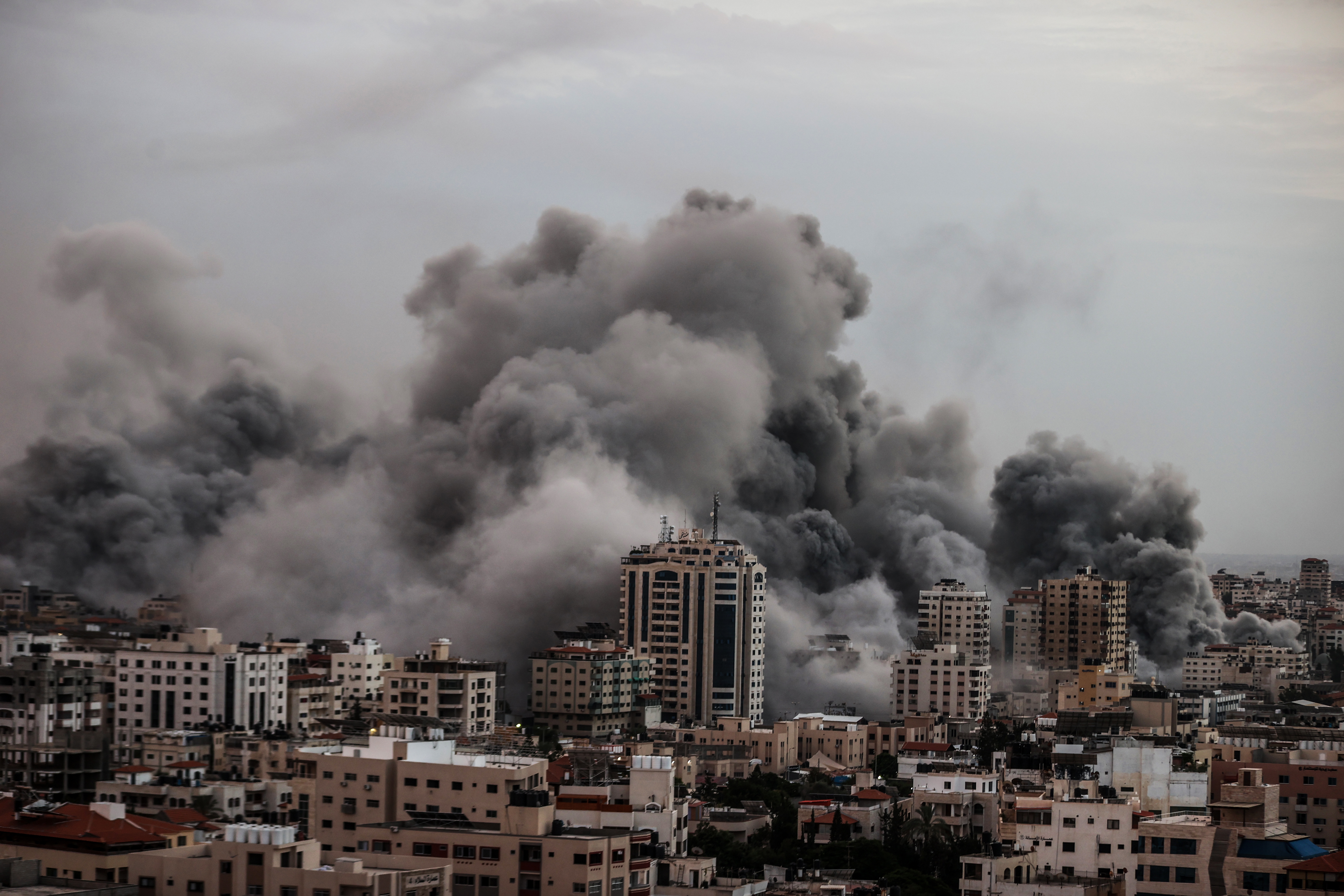 GAZA CITY, GAZA - OCTOBER 09: Smoke rises over the buildings as the Israeli airstrikes continue in Al-Rimal Neighbourhood of Gaza City, Gaza on October 9, 2023. ( Ali Jadallah - Anadolu Agency )