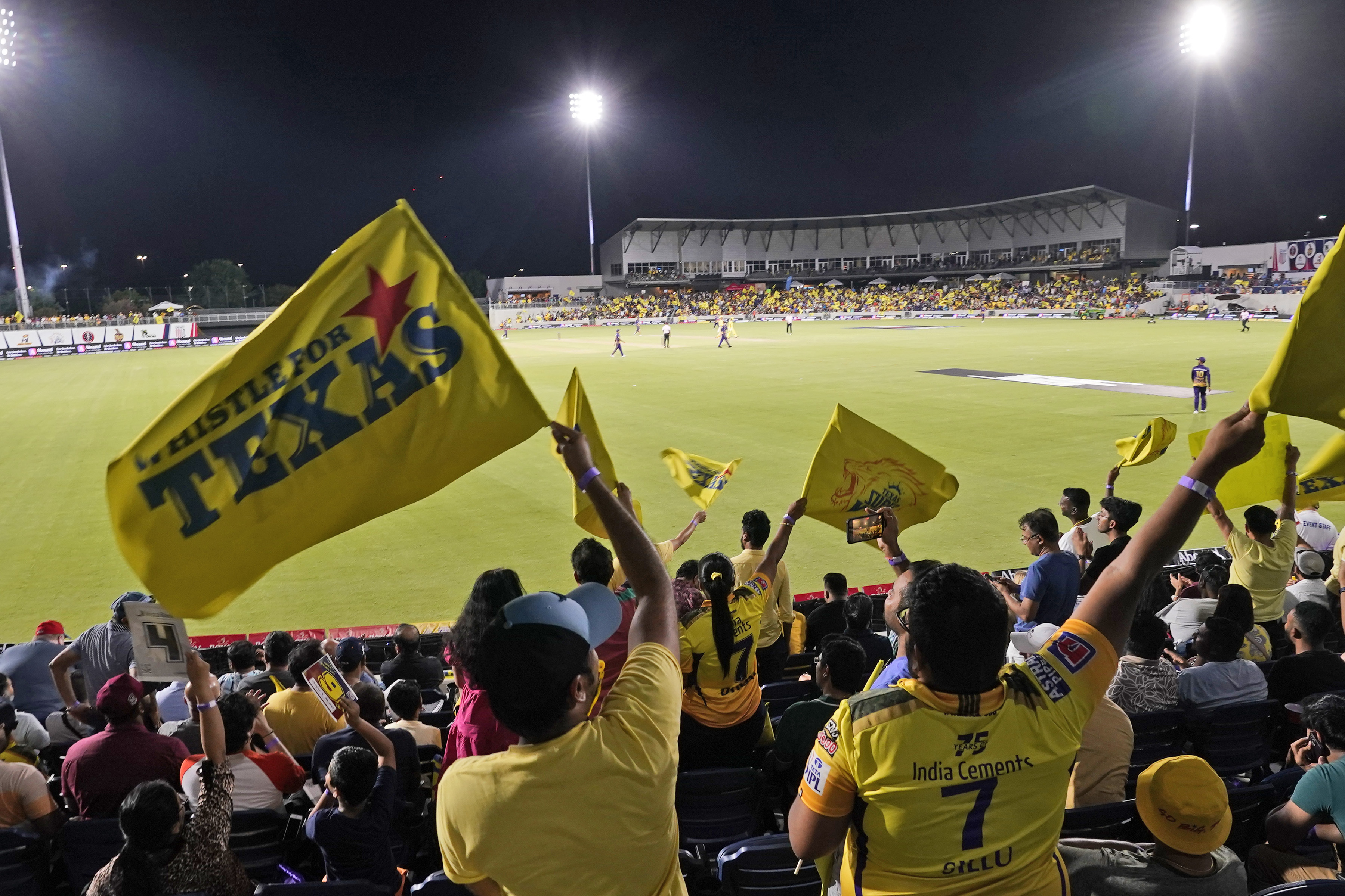 Fans in the stands watch the Texas Super Kings and Los Angeles Knight Riders compete in a Major League Cricket match in Grand Prairie, Texas, Thursday, July 13, 2023. (AP Photo/LM Otero)