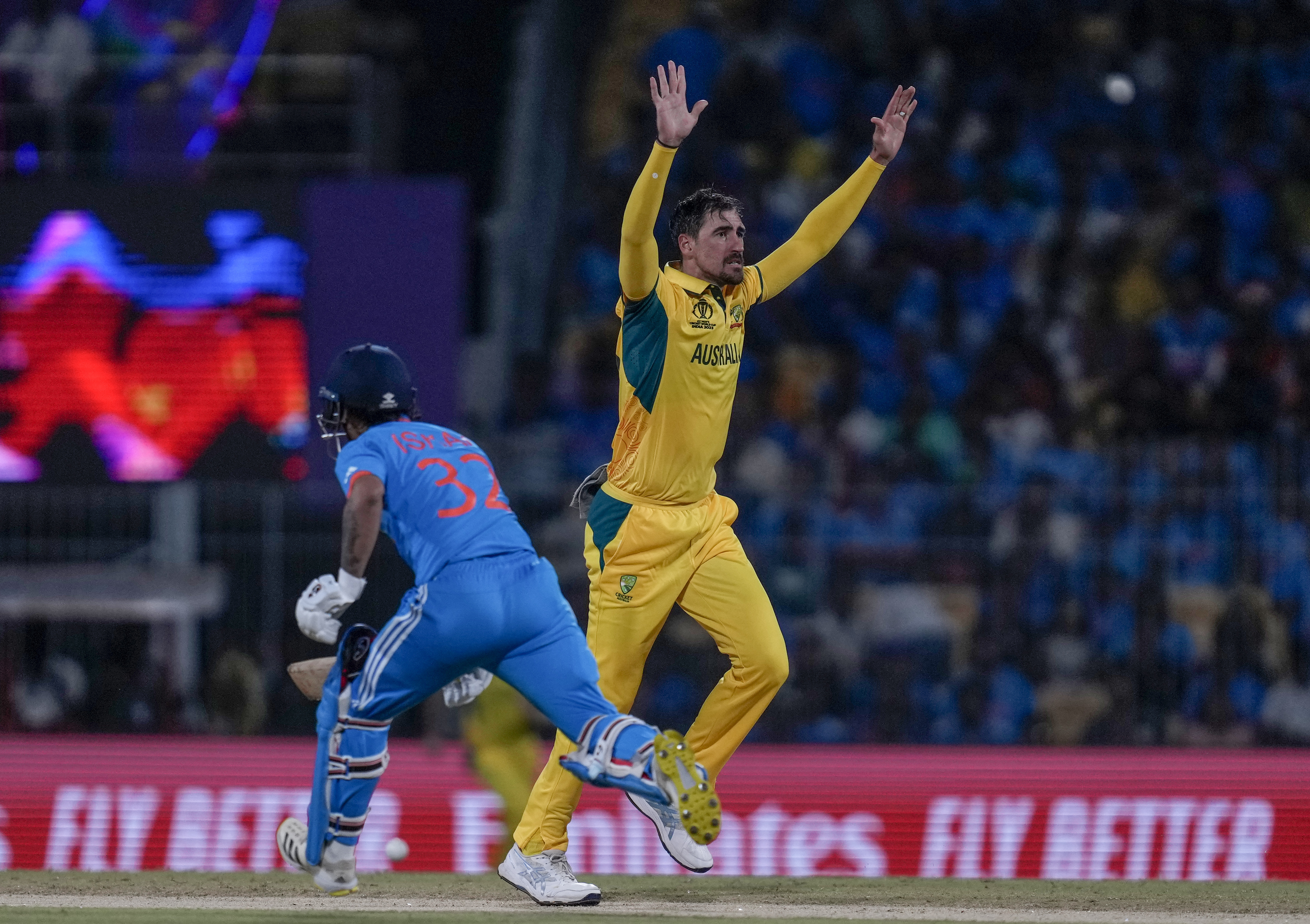 Australia's Mitchell Starc appeals unsuccessfully for the wicket of India's captain Rohit Sharma