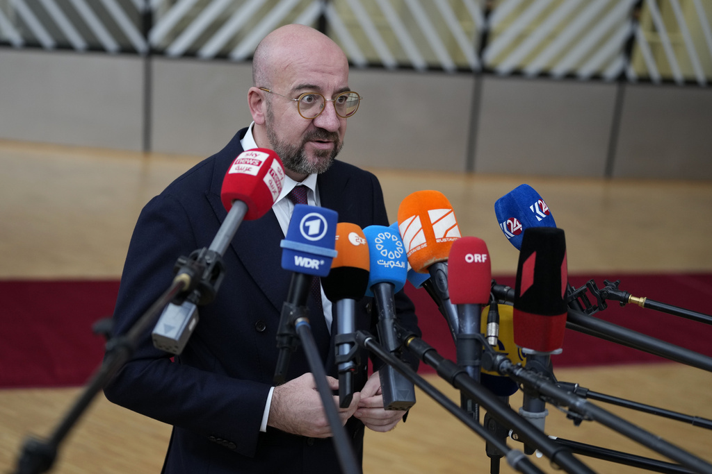 EC President Charles Michel speaks before reporters