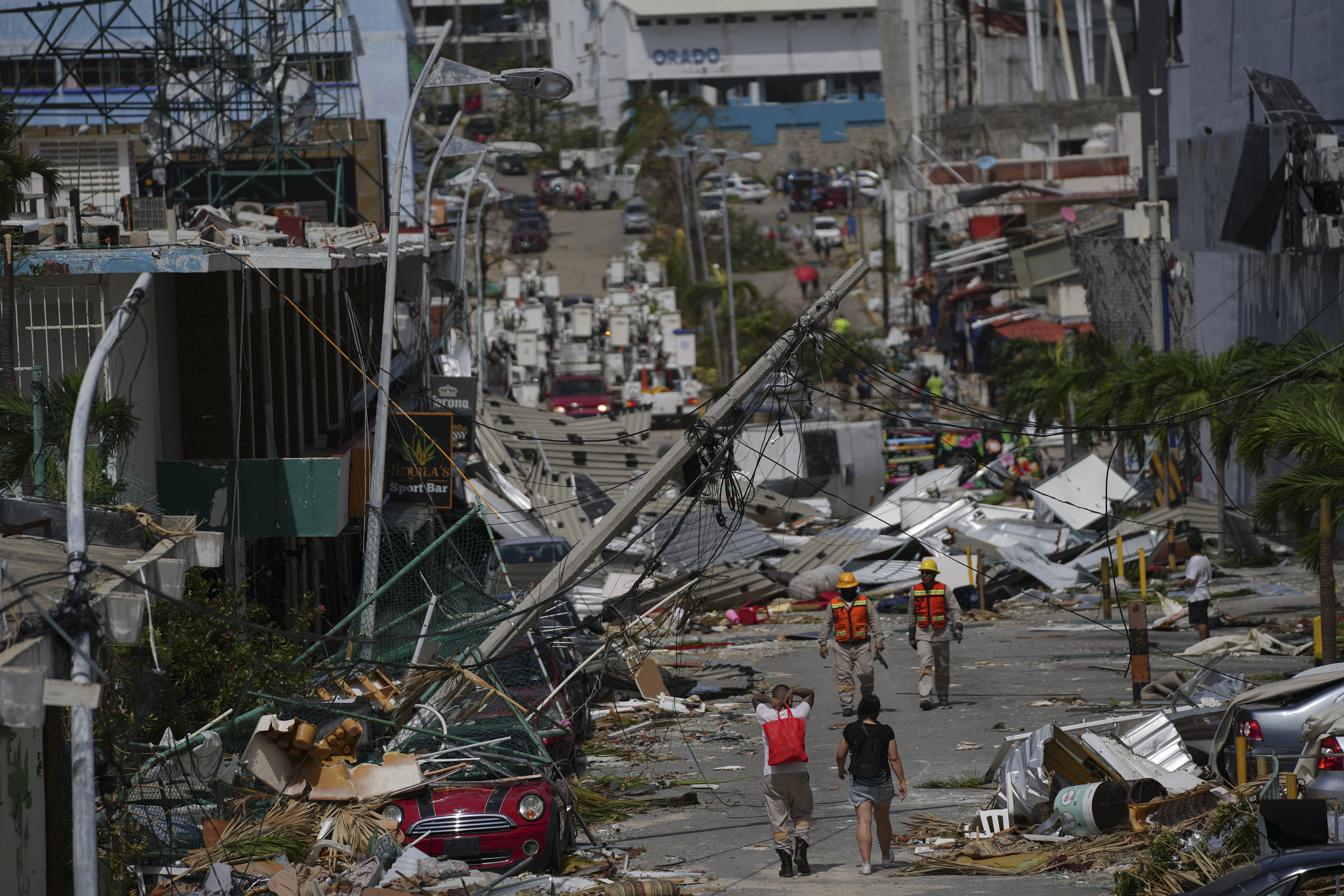 Debris lays on a road after Hurricane Otis ripped through Acapulco