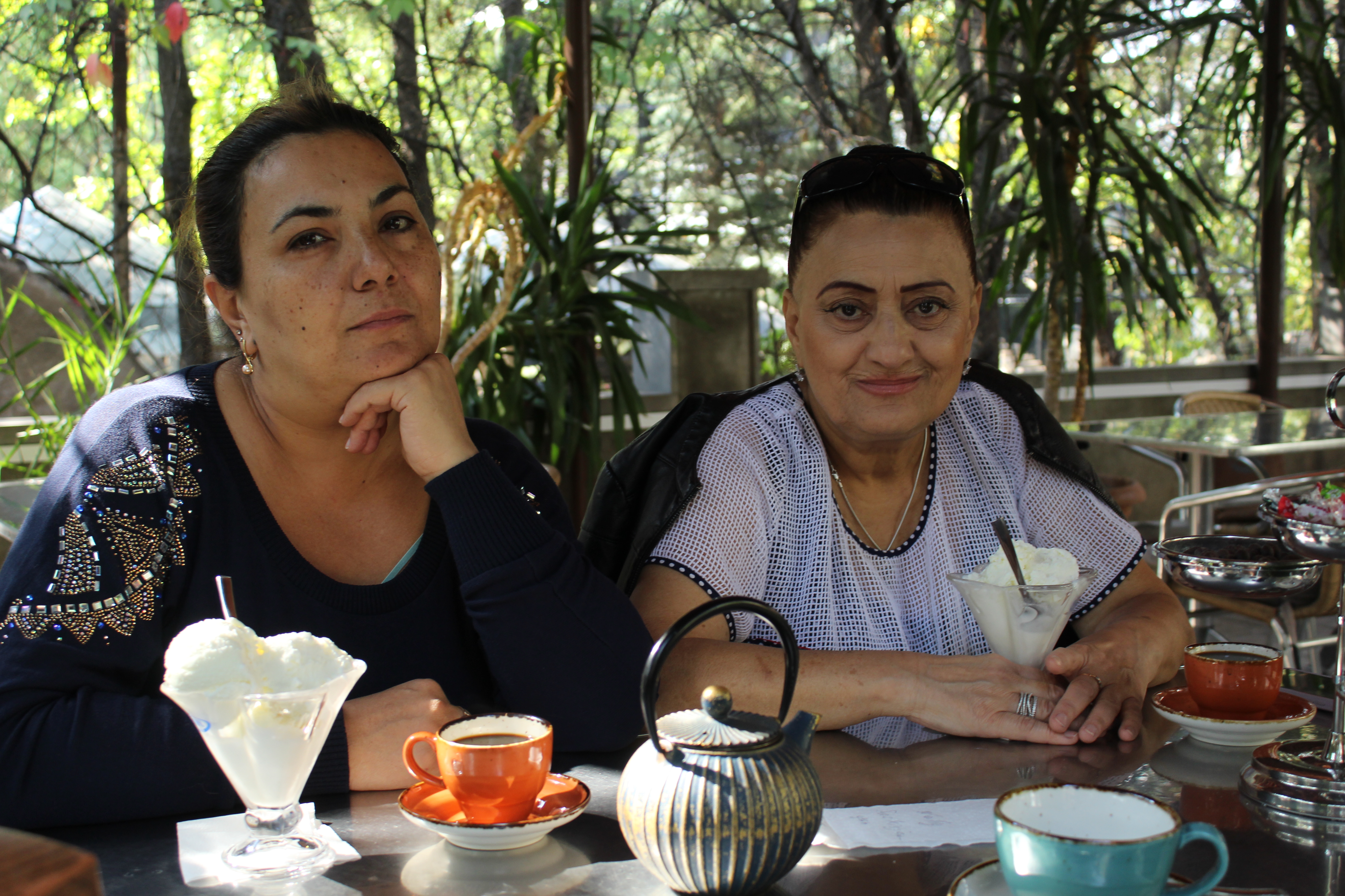 Angela Sazkisjan-Yan eats ice cream for the first time since the start of the Azerbaijan-imposed blockade with her neice Narine at a cafe in Abovyan where she is staying with her sister's family-1696579761