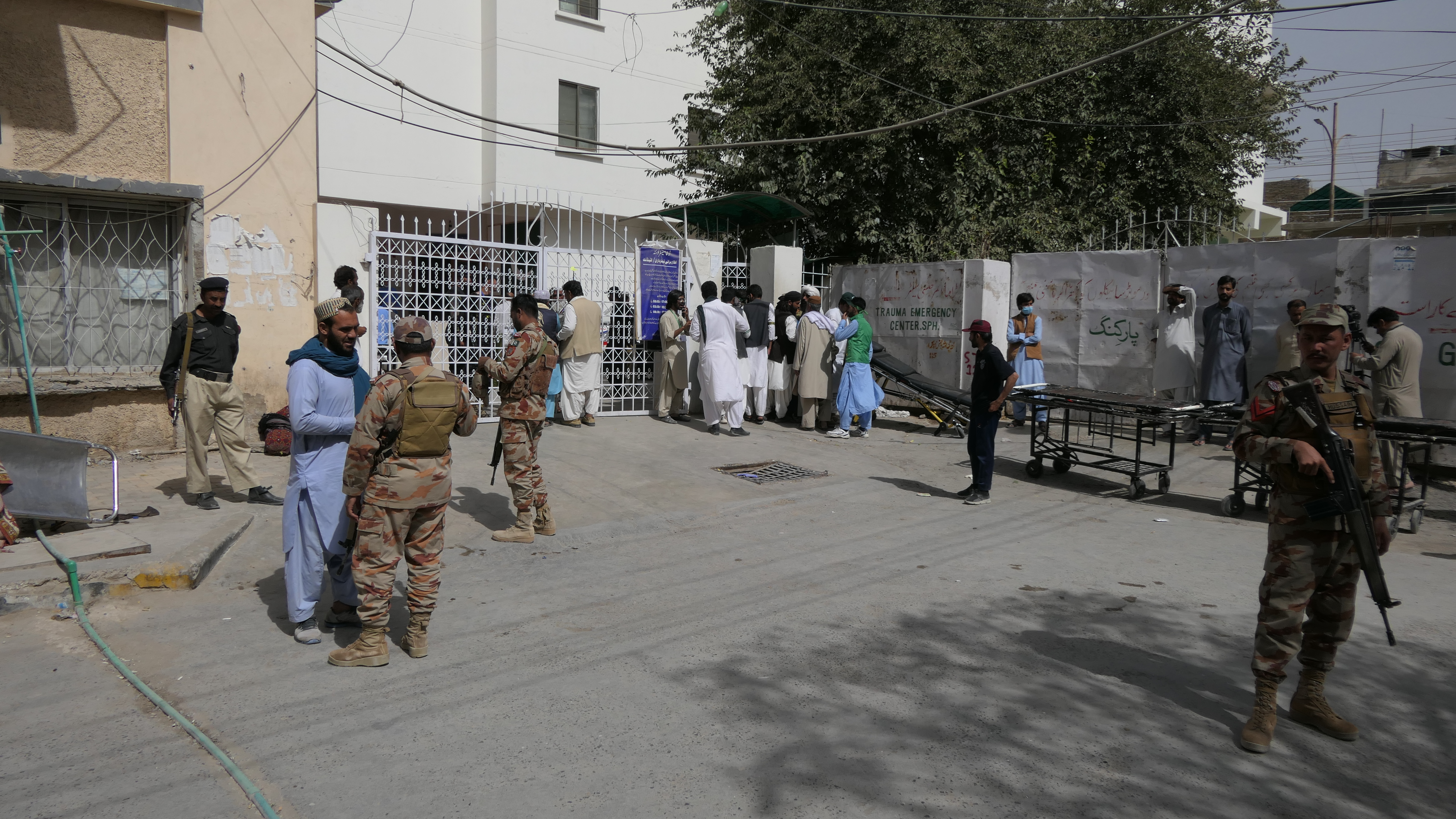 Relatives visiting family members injured in the suicide bombing in Mastung, Balochistan, at the Quetta hospital where they are receiving treatment on Monday, October 1, 2023 [Saadullah Akhter/Al Jazeera]