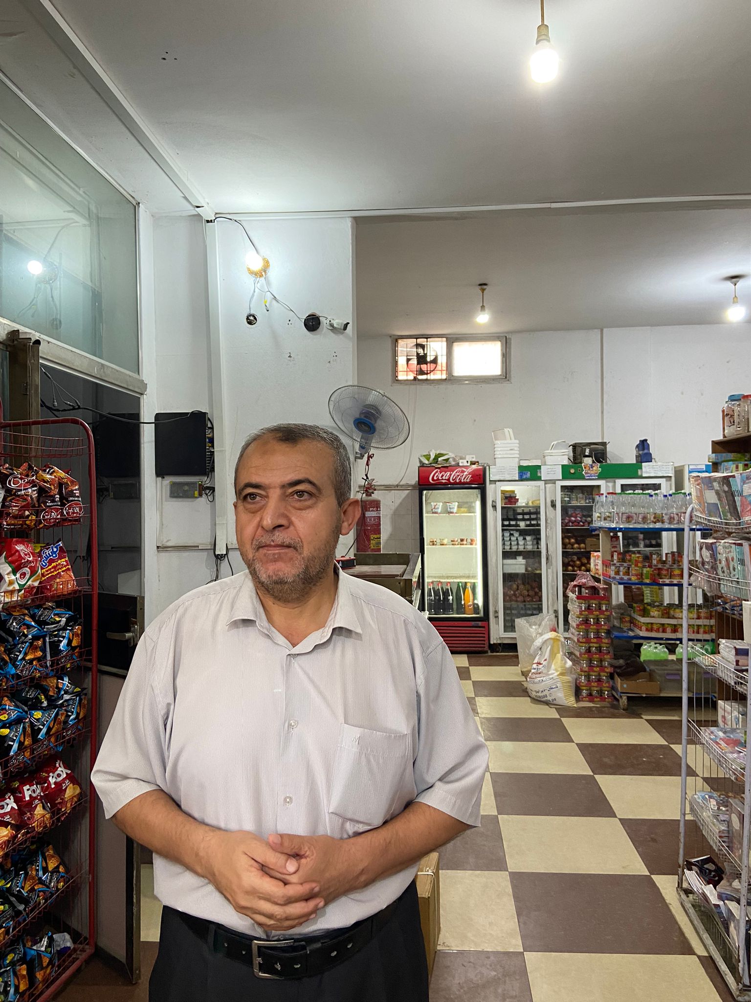 Abdel Halim Albanna, the owner of Albanna Supermarket in the heart of Deir el-Balah