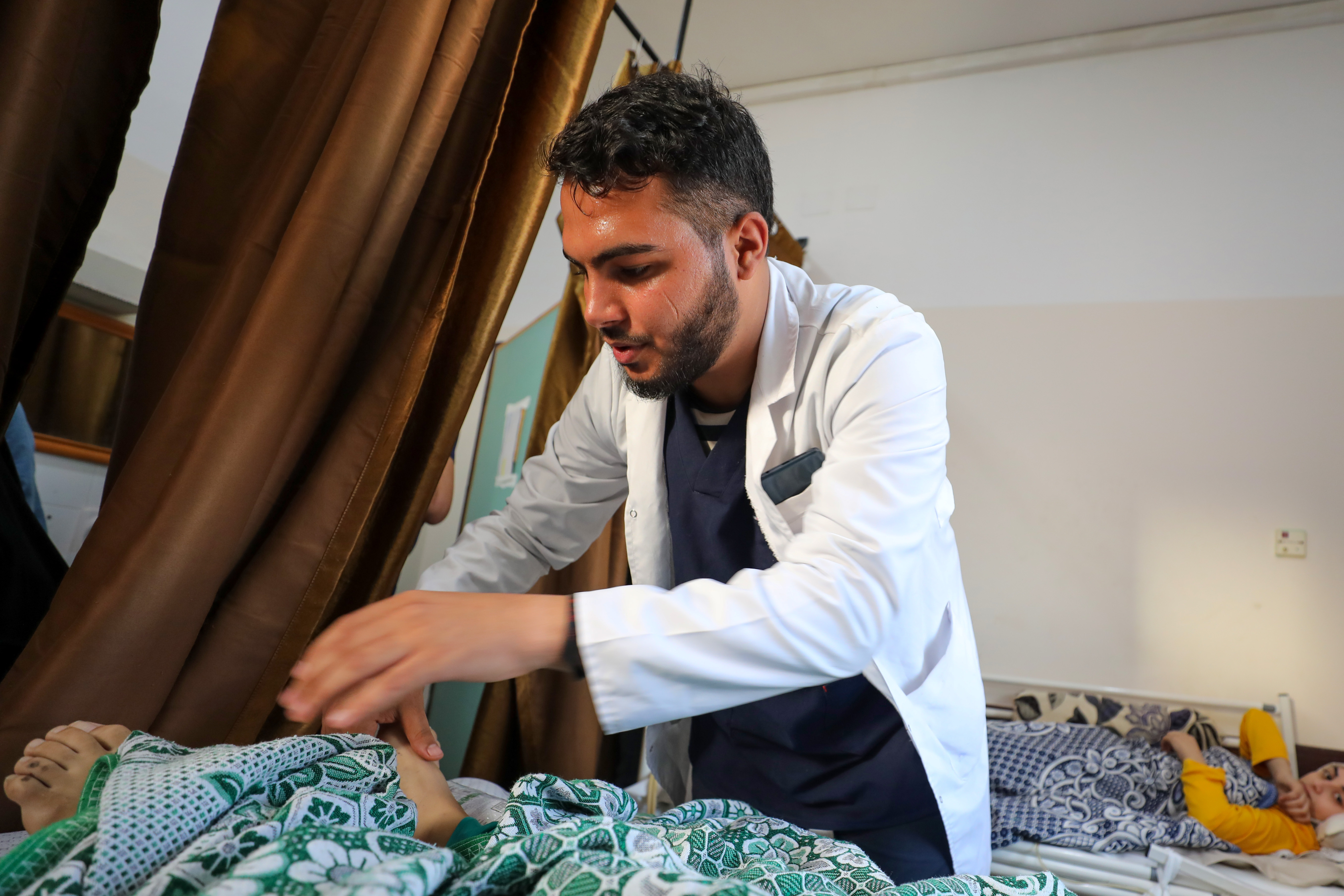 Mohammad Abu Salem, 25, vollunteer at the physiotherapy department