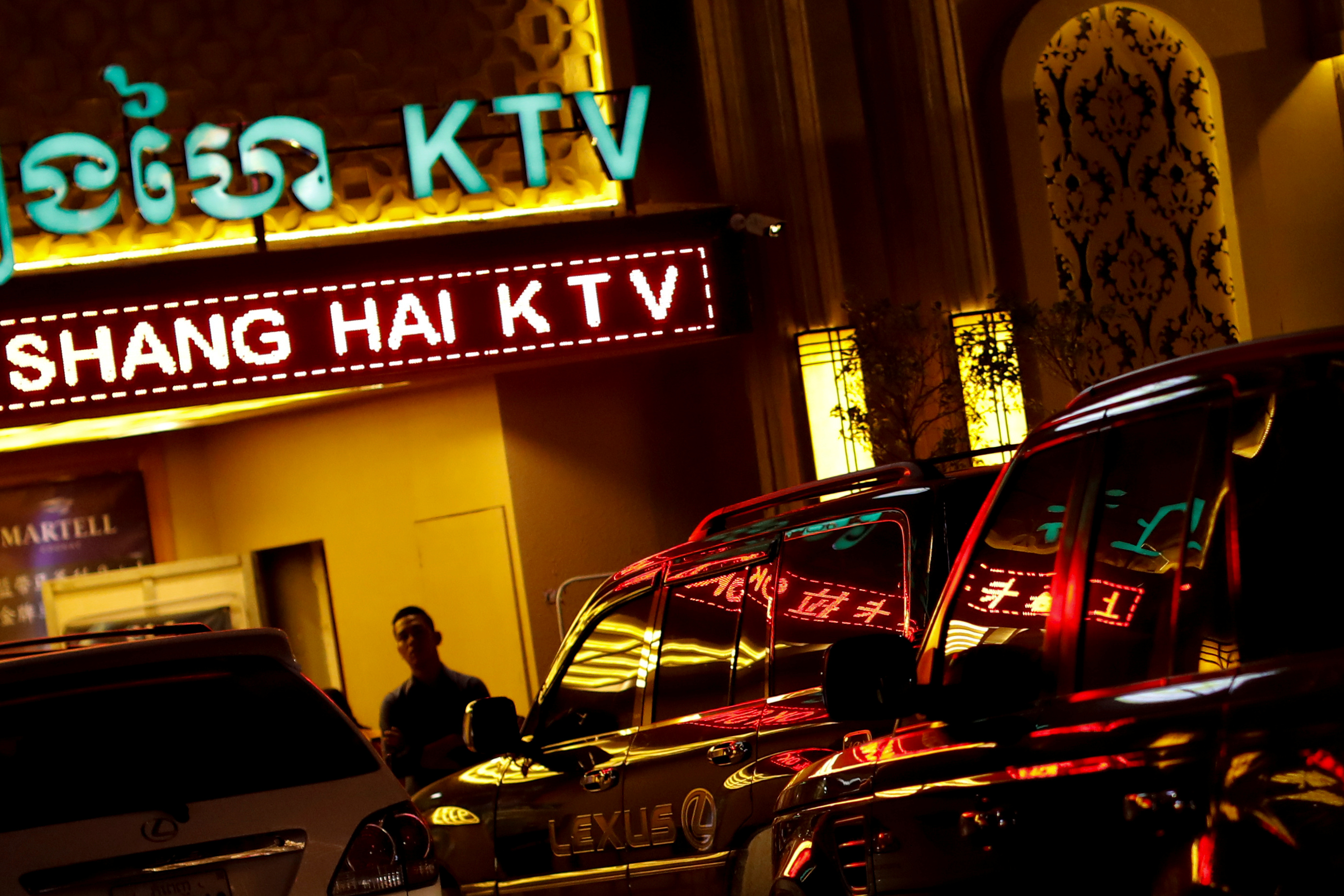 A karaoke bar in Sihanoukville. It's lit up for the evening.