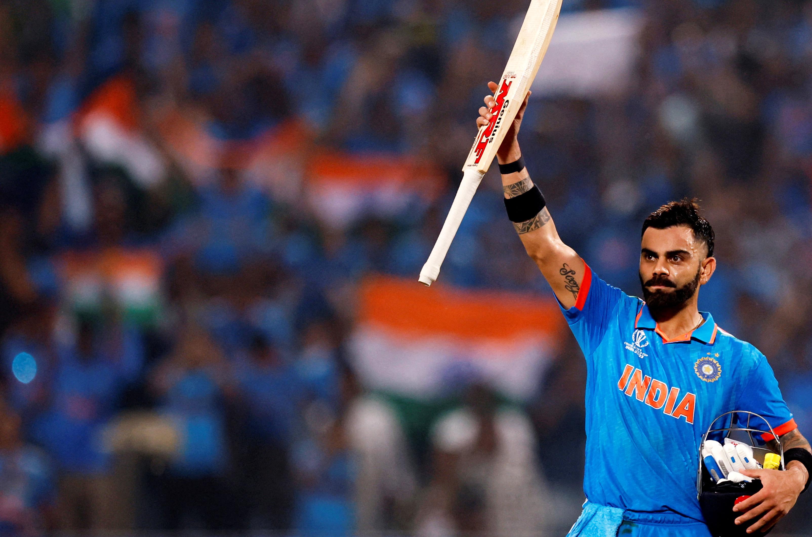 Cricket - ICC Cricket World Cup 2023 - India v Bangladesh - Maharashtra Cricket Association Stadium, Pune, India - October 19, 2023 India's Virat Kohli celebrates reaching his century and winning the match REUTERS/Adnan Abidi TPX IMAGES OF THE DAY