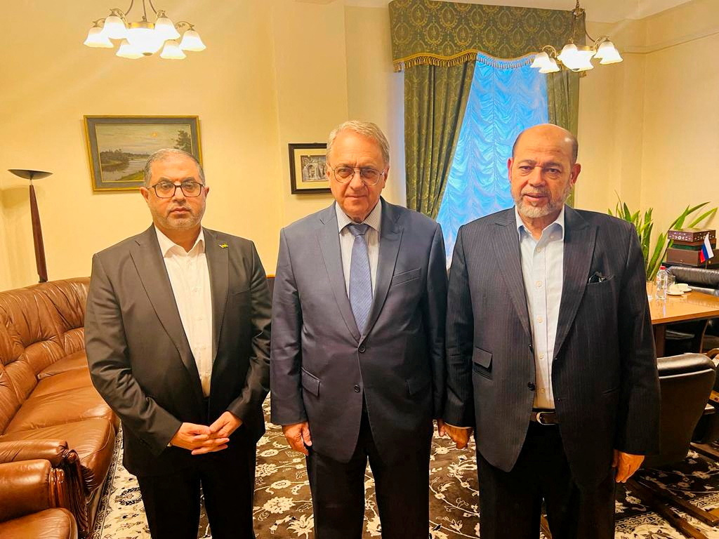 Senior Hamas officials Bassem Naim and Moussa Abu Marzouk, and Russia's Deputy Foreign Minister Mikhail Bogdanov meet for talks on the release of foreign hostages, at a location given as Moscow, Russia in this handout image released on October 26, 2023. Hamas Handout/Handout via REUTERS THIS IMAGE HAS BEEN SUPPLIED BY A THIRD PARTY