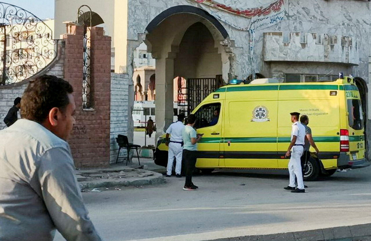 Security guards check an Egyptian ambulance carrying critically injured Palestinians as they arrive at Al-Arish hospital through the Rafah border crossing, amid the ongoing conflict between Israel and the Palestinian Islamist group Hamas in the city of Al-Arish, Sinai Peninsula, Egypt November 1, 2023. REUTERS/Stringer