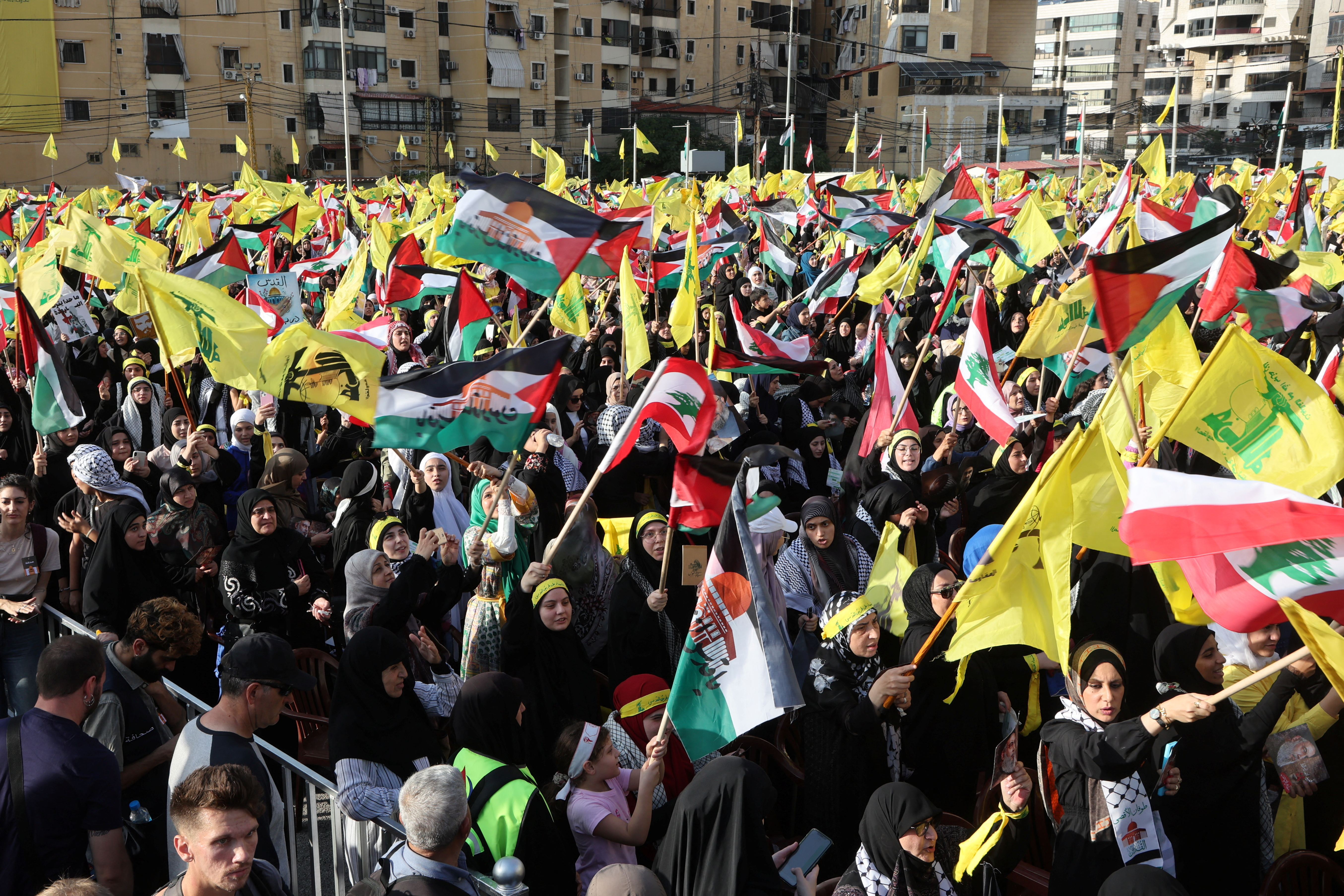 Hezbollah supporters gather to attend a ceremony to honour fighters killed in the recent escalation with Israel, to watch Lebanon's Hezbollah leader Sayyed Hassan Nasrallah's address, in Beirut's southern suburbs, Lebanon.