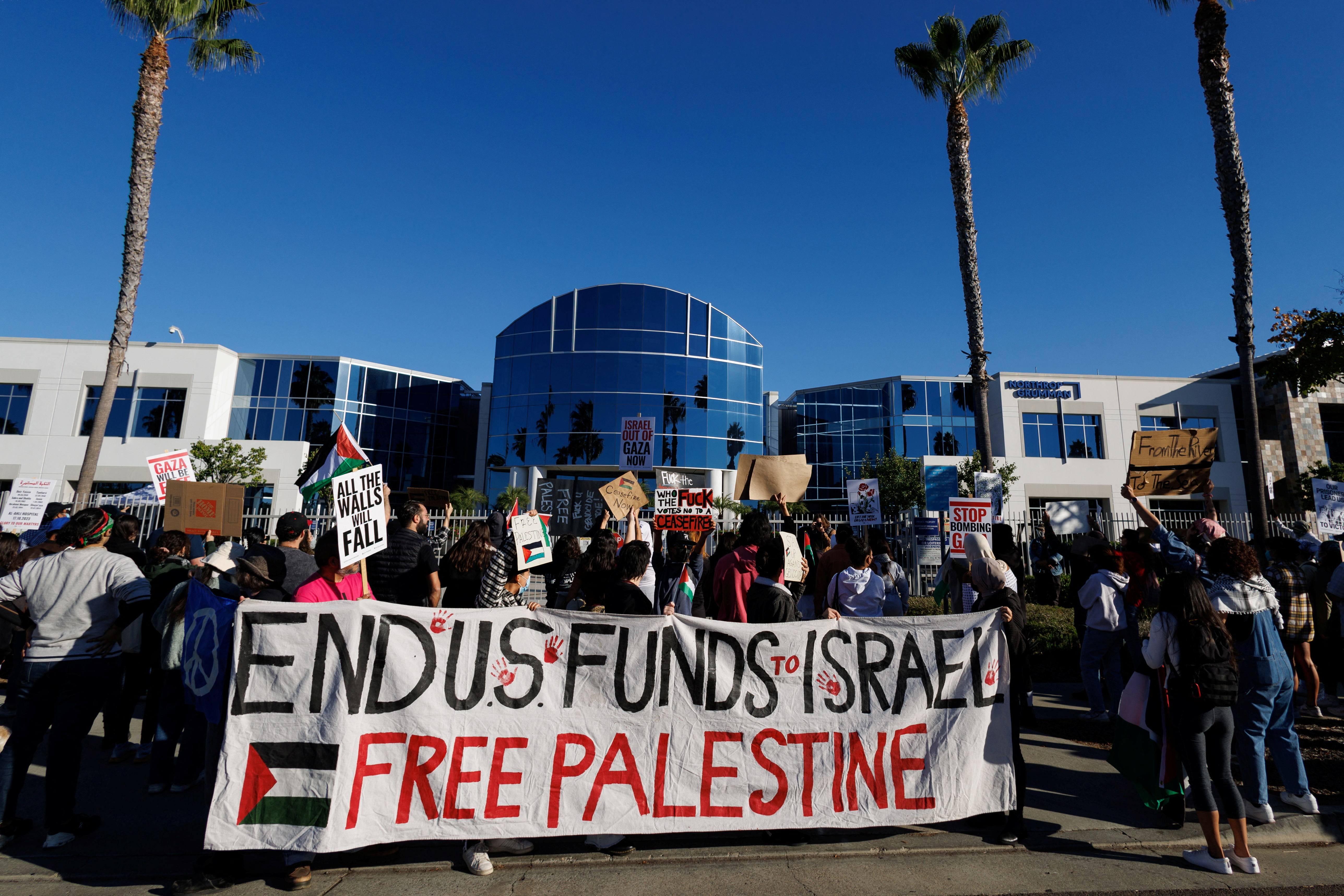 Pro Palestinian demonstrators gather outside a Northrop Grumman office complex to protest the sale of their weapons to Israel, in San Diego, California, US, November 9, 2023