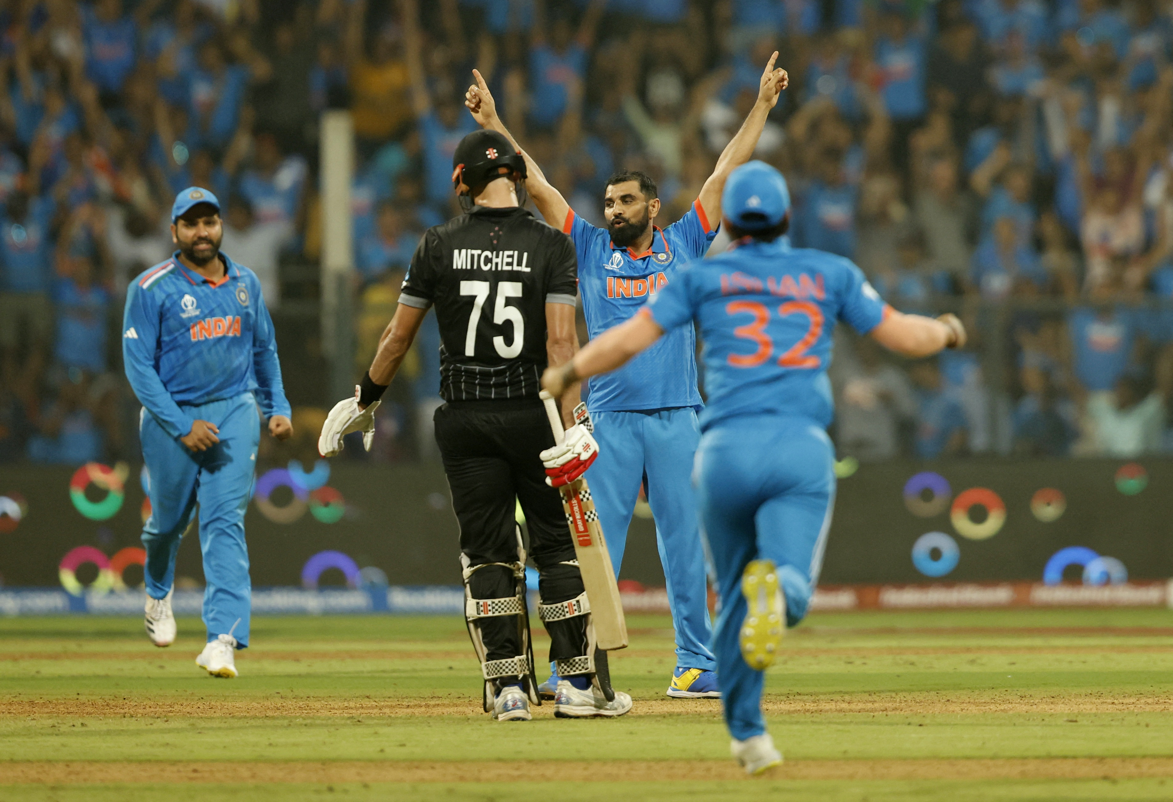 Cricket - ICC Cricket World Cup 2023 - Semi-Final - India v New Zealand - Wankhede Stadium, Mumbai, India - November 15, 2023 India's Mohammed Shami celebrates after taking the wicket of New Zealand's Kane Williamson, caught out by Suryakumar Yadav REUTERS/Francis Mascarenhas