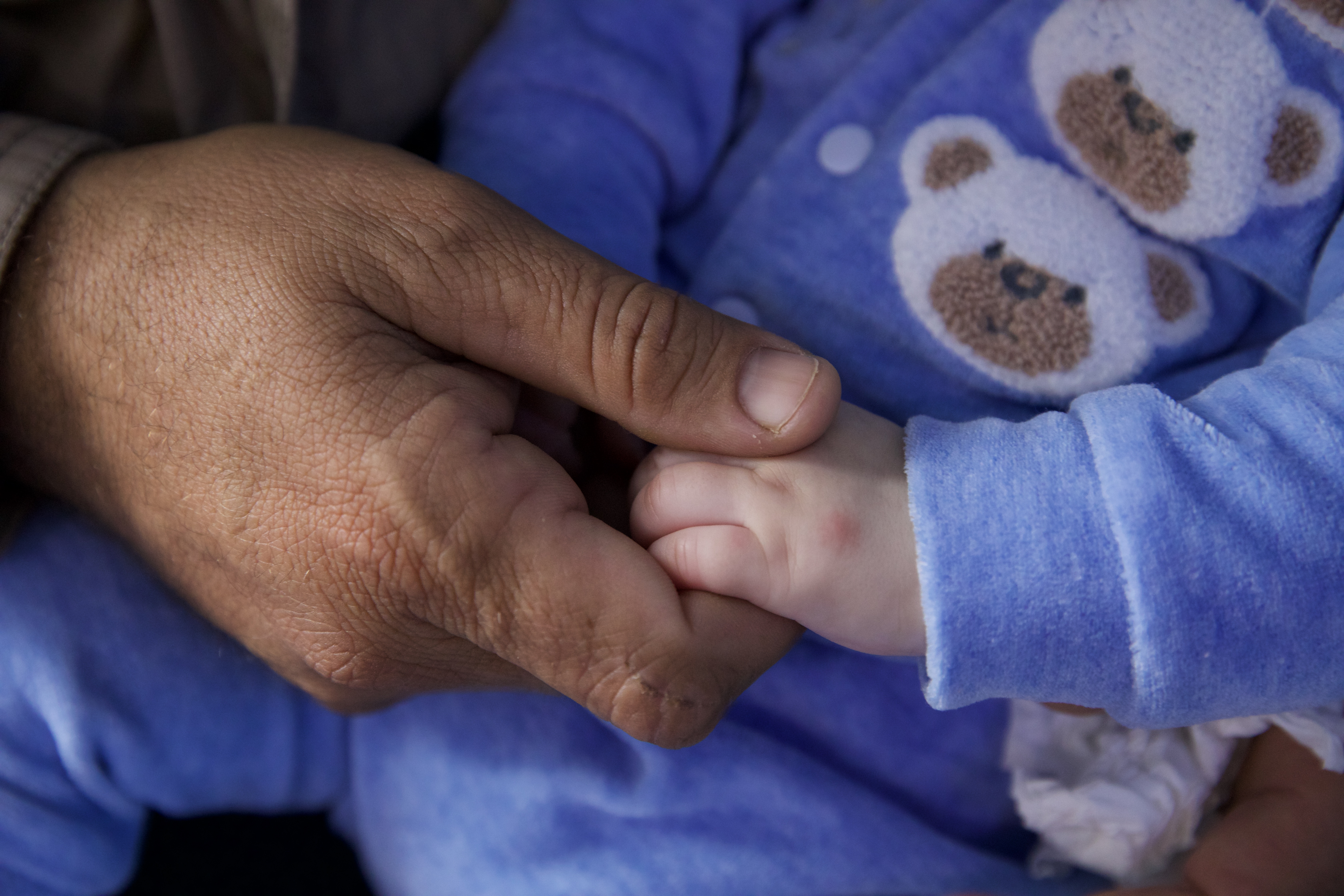 Abdul Khaliq Msalahlou with his son, Ahmed, at Child's House.