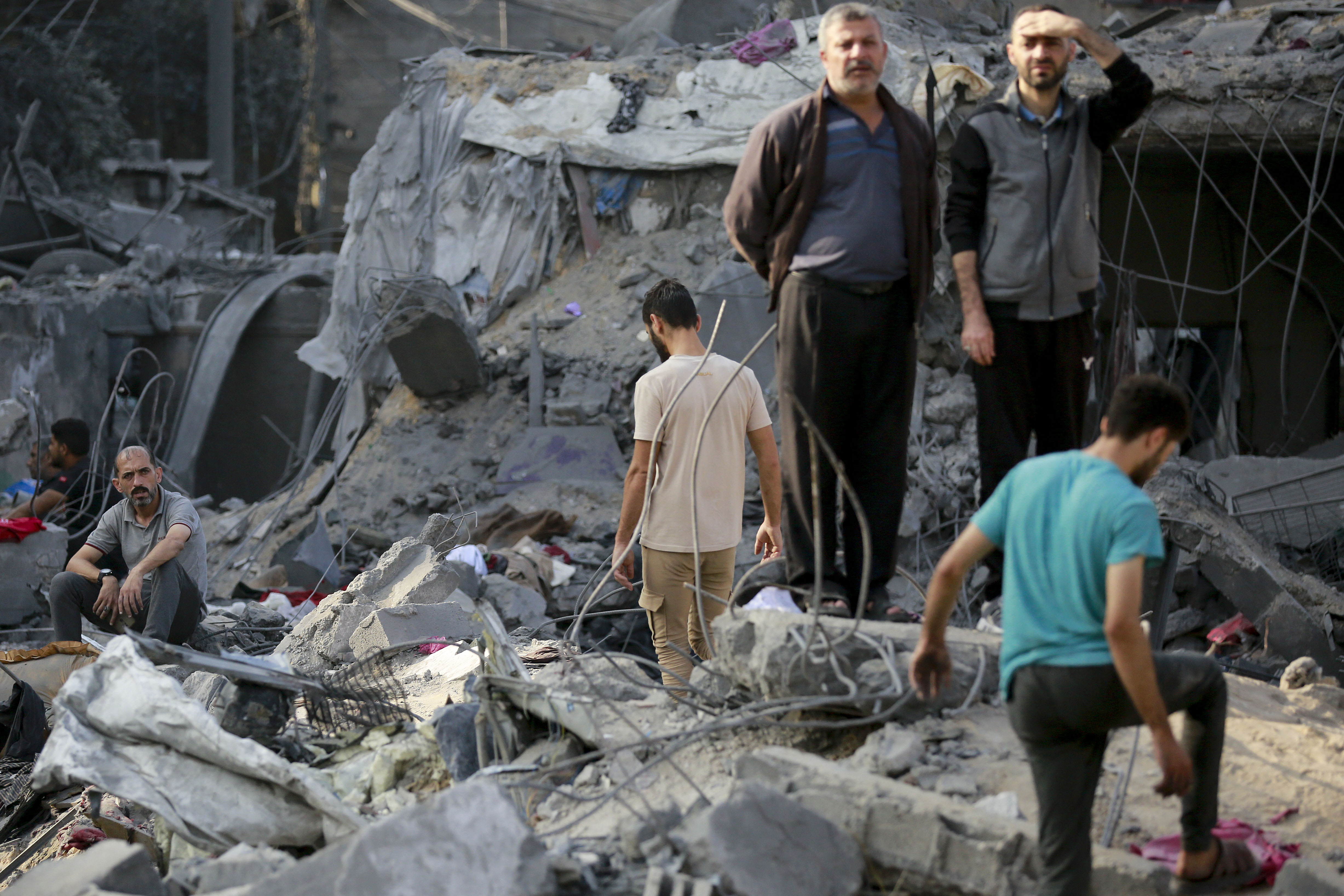 Palestinians check the destruction in the aftermath of an Israeli strike in the Jabalia camp for Palestinian refugees in the Gaza Strip.