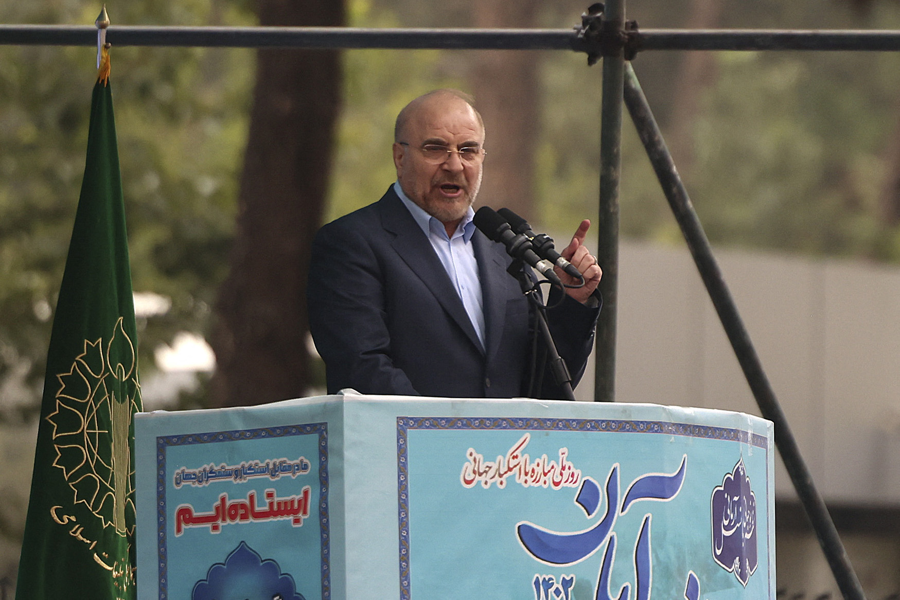 Iranian Parliament Speaker Mohammad Bagher Ghalibaf speaks during a rally outside the former US embassy in Tehran, to support the Palestinians of the Gaza Strip and to mark the 44th anniversary of the start of the Iran hostage crisis.