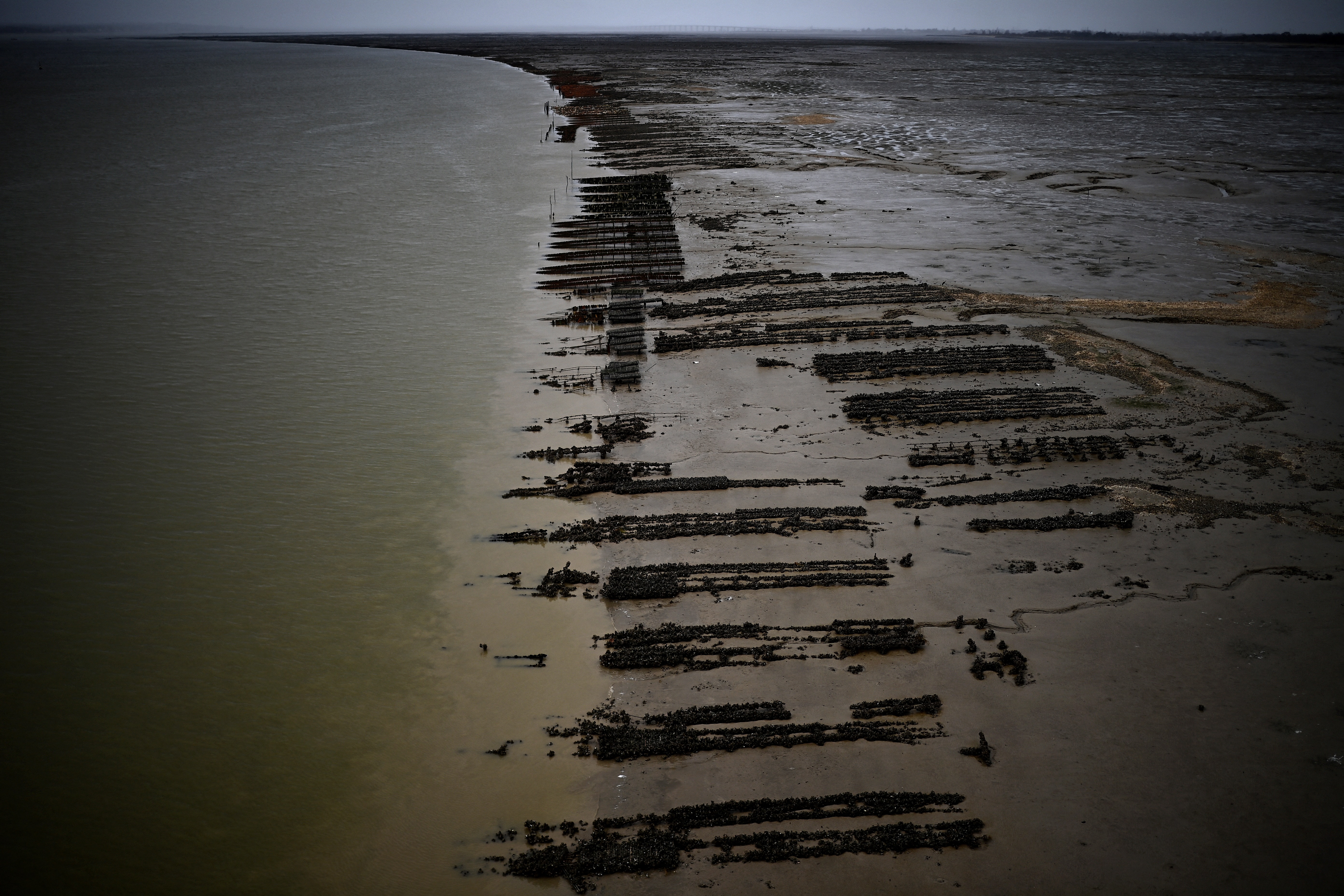 This picture shows an oyster park along the Seudre river in Marennes, south-western France.