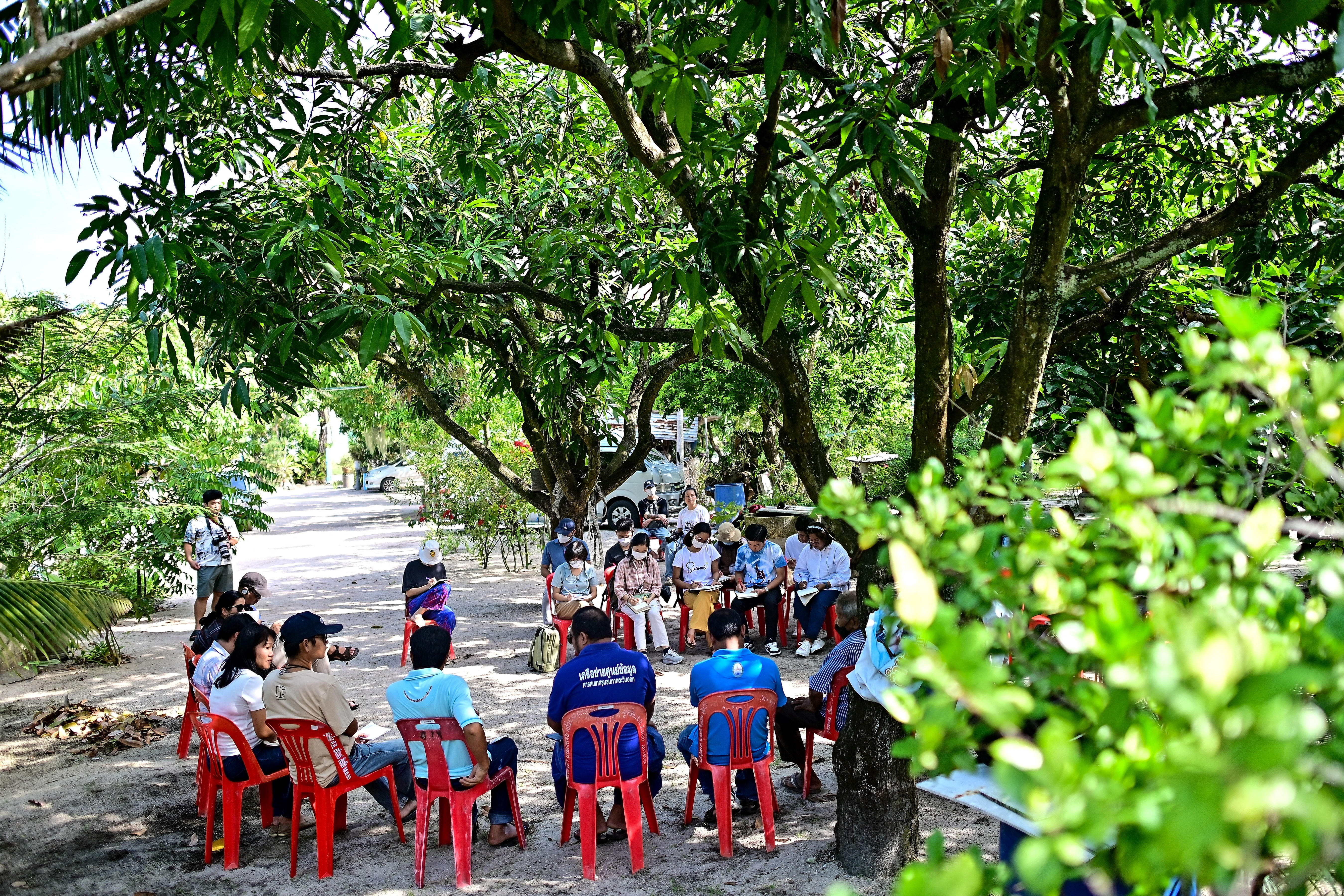 This photograph taken on November 7, 2023 shows environment activists studying with the EarthRights School during a field trip in the coastal Thai province of Rayong.