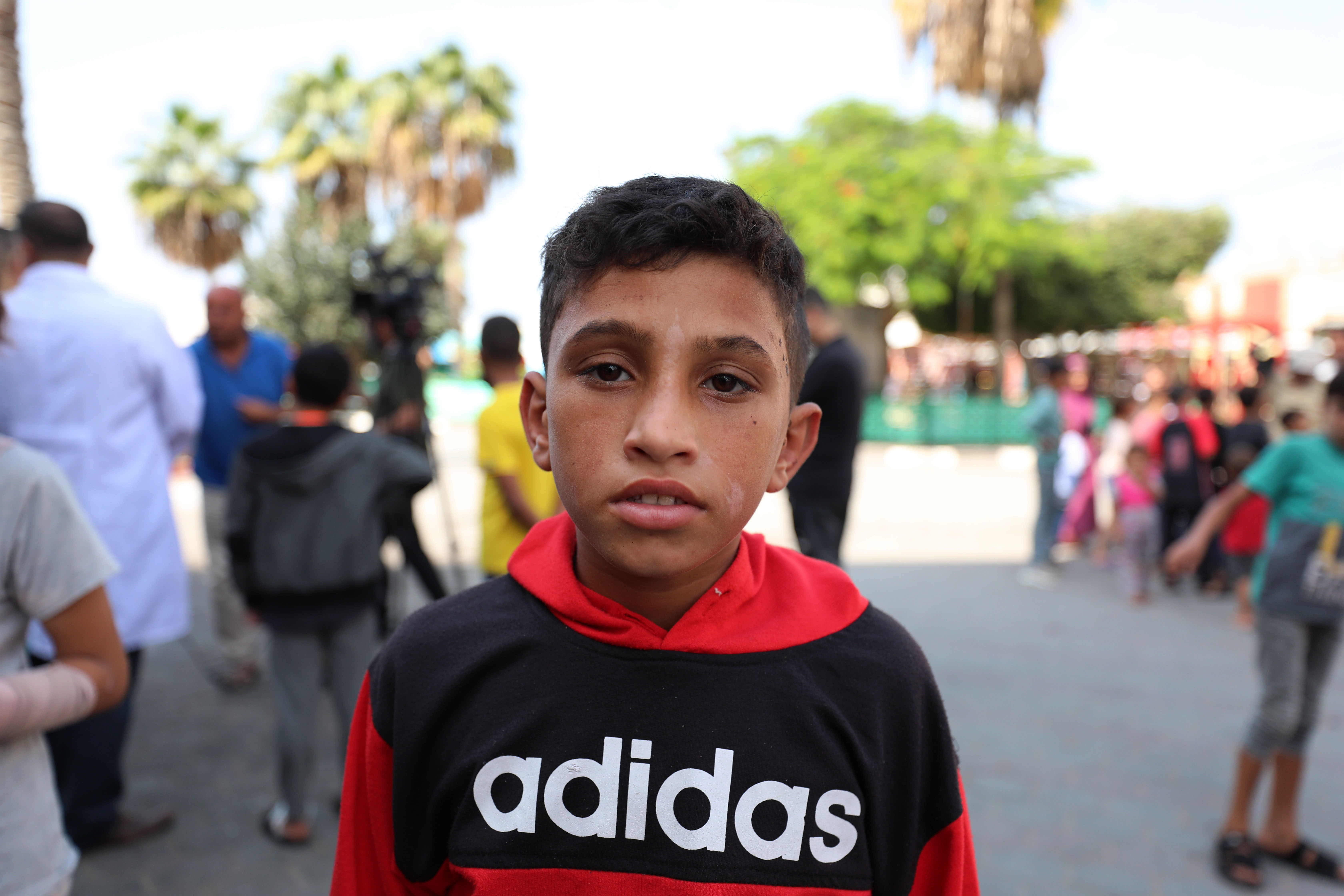 Anas al-Mansi survived an Israeli air attack on his home in Deir al-Balah but his father got killed