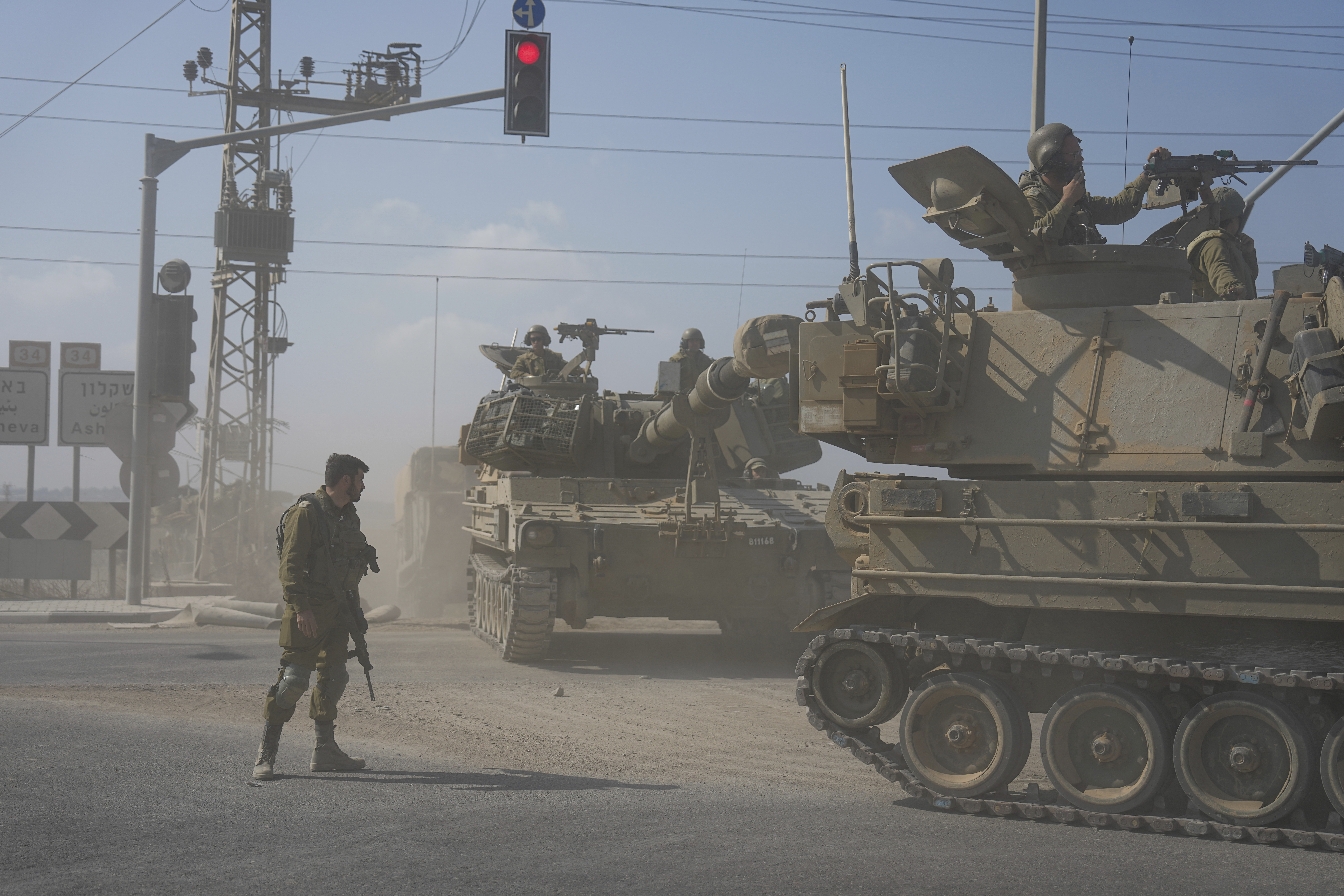 Israeli army tanks move towards the Gaza Strip border in southern Israel Wednesday, Nov.1, 2023. Israeli ground forces have been operating in Gaza in recent days as Israel presses ahead with its war against Hamas militants. (AP Photo/Ariel Schalit)
