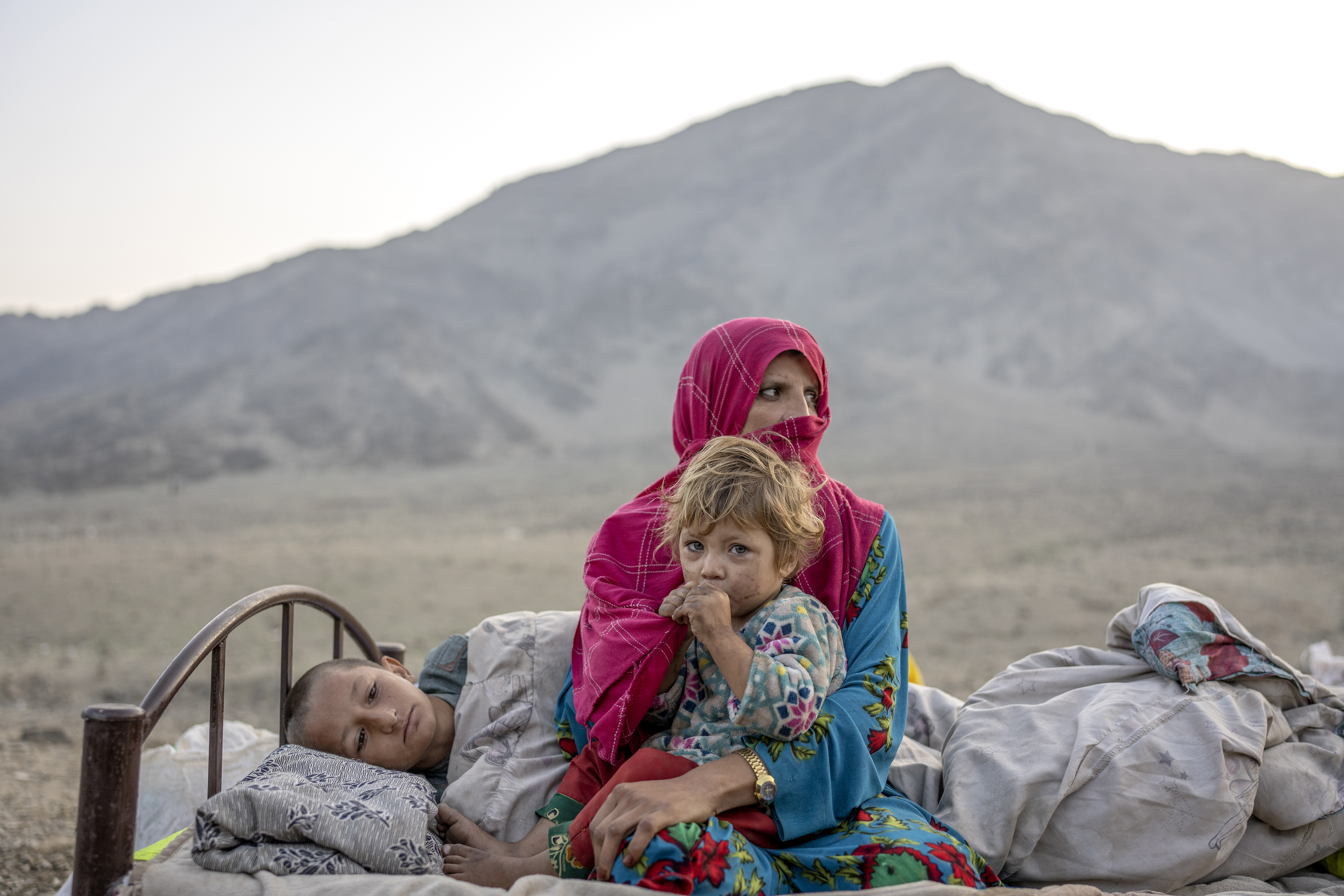 Afghan refugees settle in a camp near the Torkham Pakistan-Afghanistan border in Torkham, Afghanistan, Saturday.