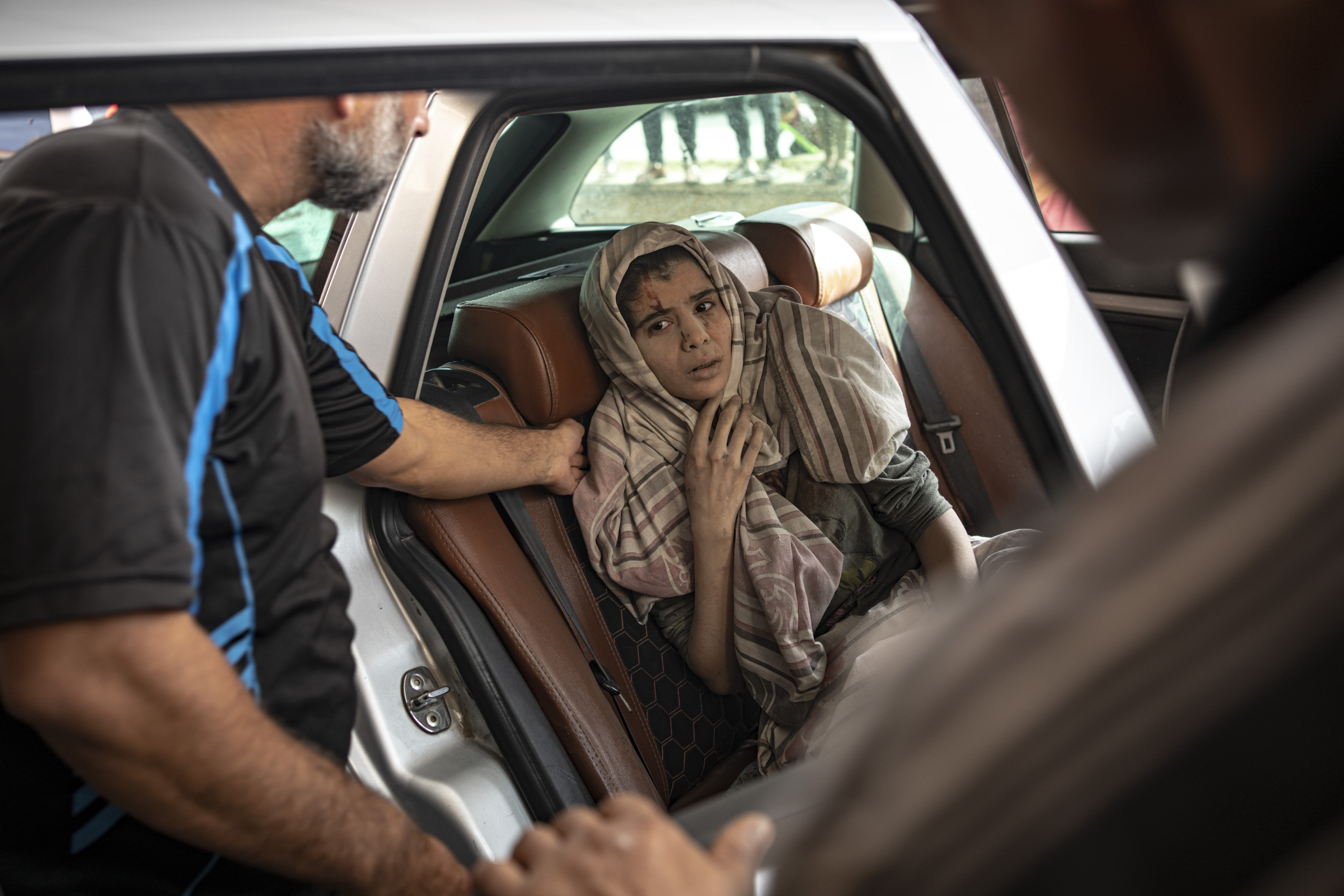 A Palestinian wounded in Israeli bombardment of the Gaza Strip is brought to a hospital in Khan Younis.