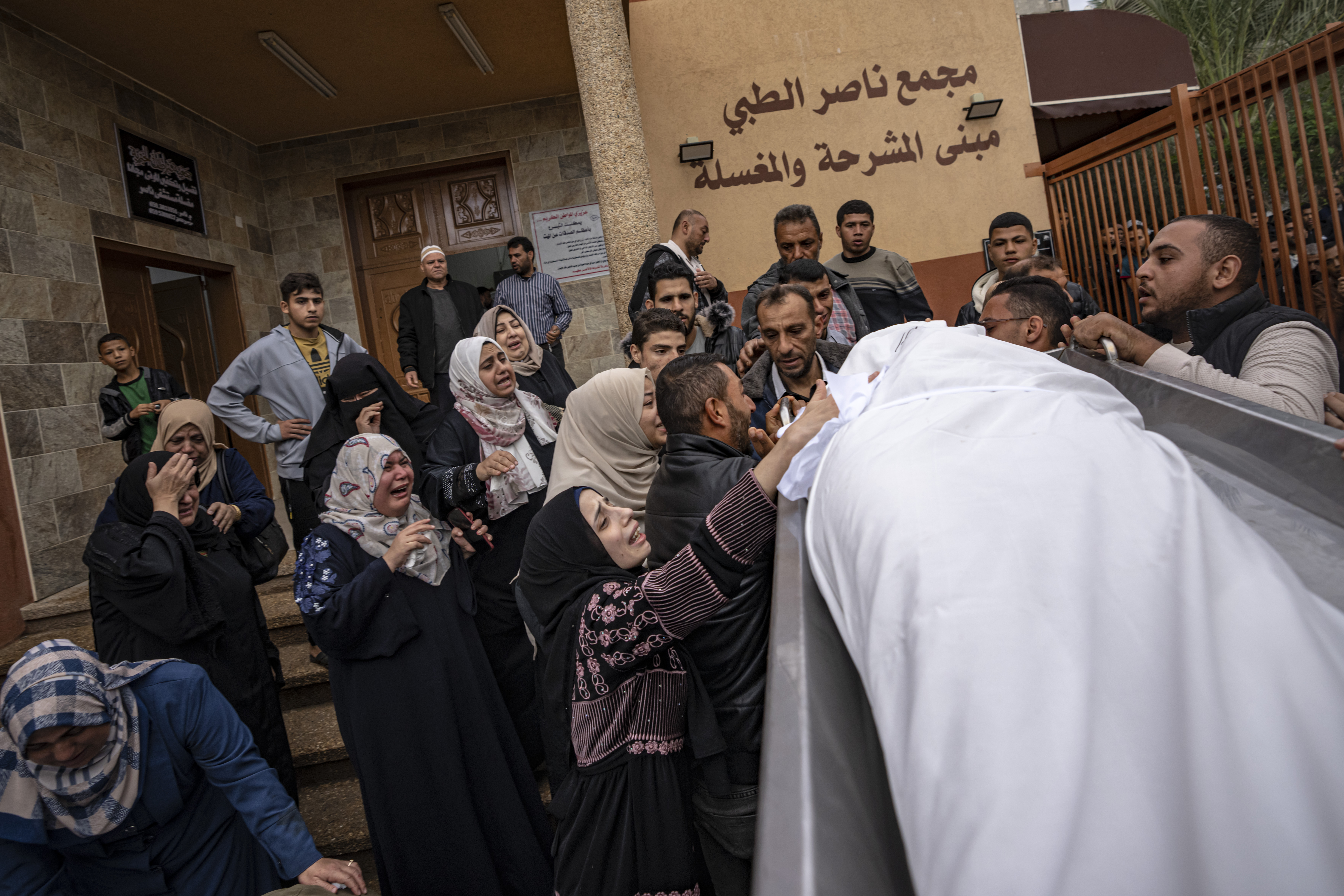 Palestinians mourn their relatives killed in the Israeli bombardment of the Gaza Strip, in the hospital in Khan Younis.