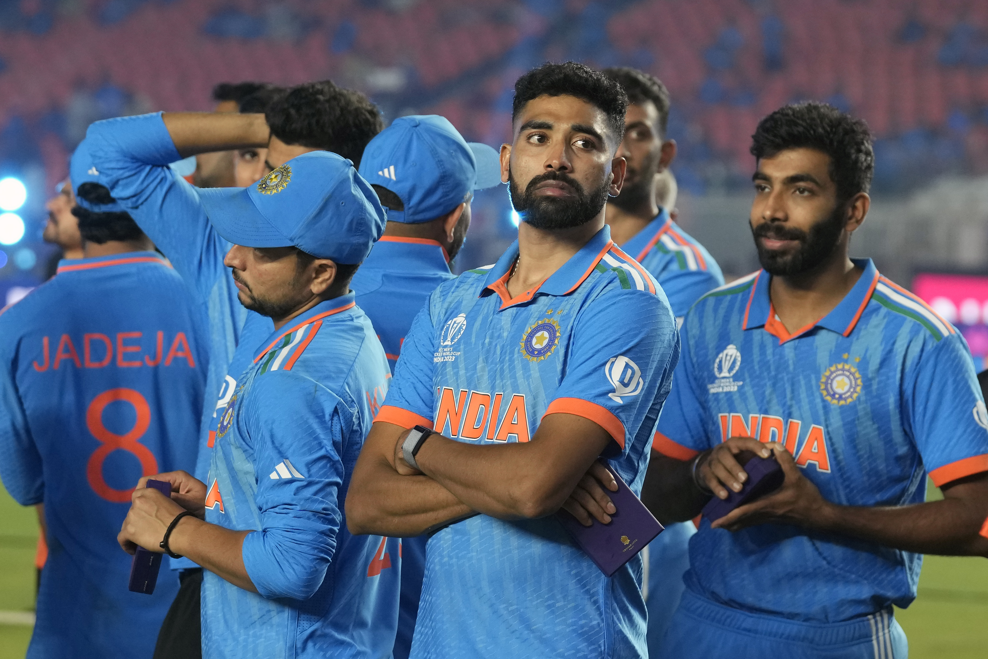 India players wait for the award ceremony after Australia won the ICC Men's Cricket World Cup final match against India in Ahmedabad, India.