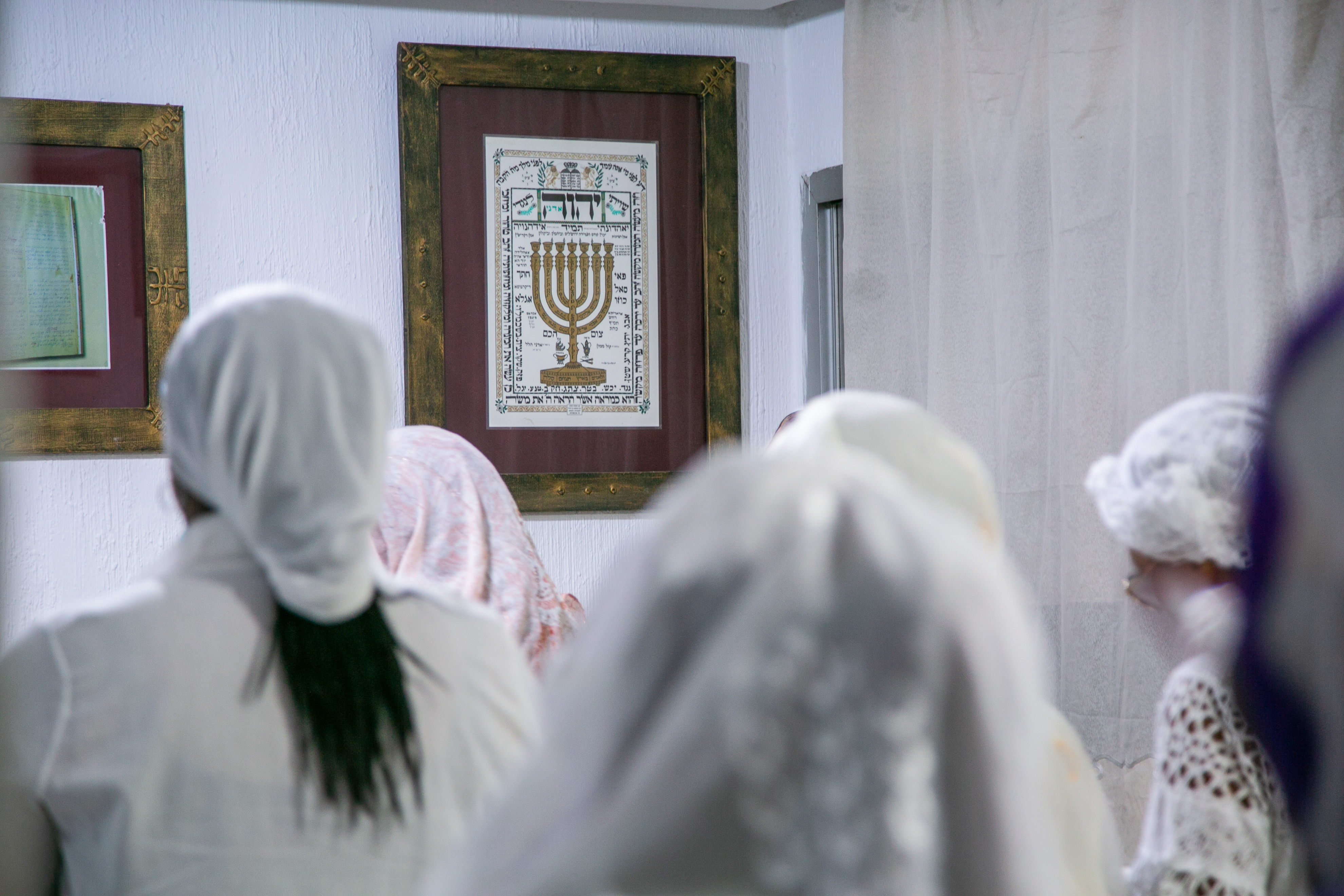 Ivorians pray facing east (Mizrah) during Shabbat services.