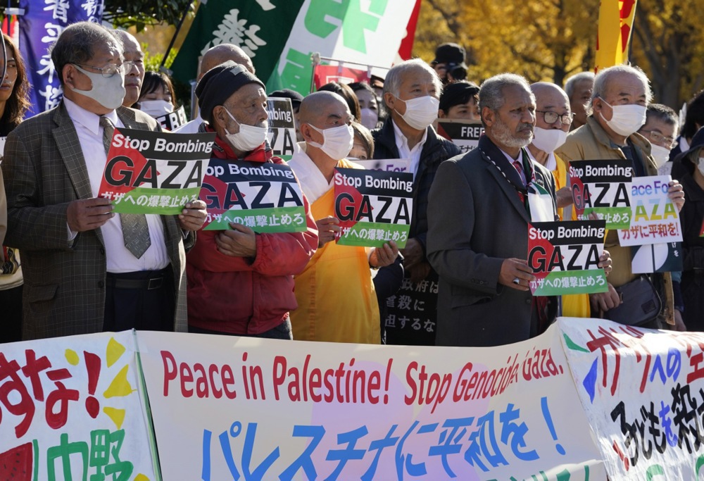 Demonstrators call for a ceasefire and peace in Gaza in front of Japan's parliament in Tokyo