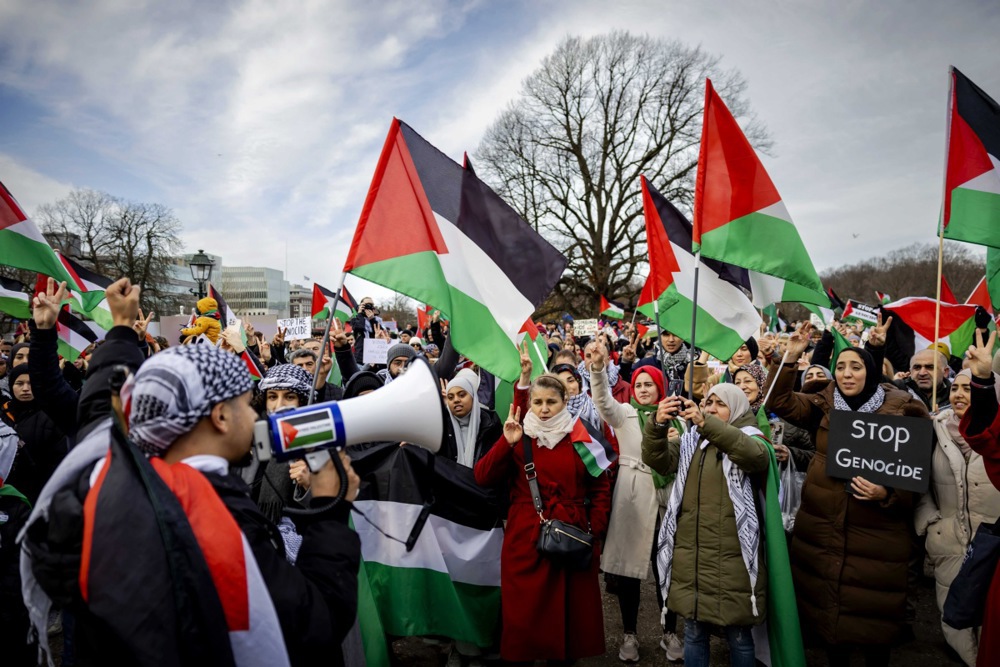 Participants in a pro-Palestinian demonstration rally in front of The Hague CS train station, to show solidarity with Palestinians people in Gaza, in The Hague, The Netherlands.